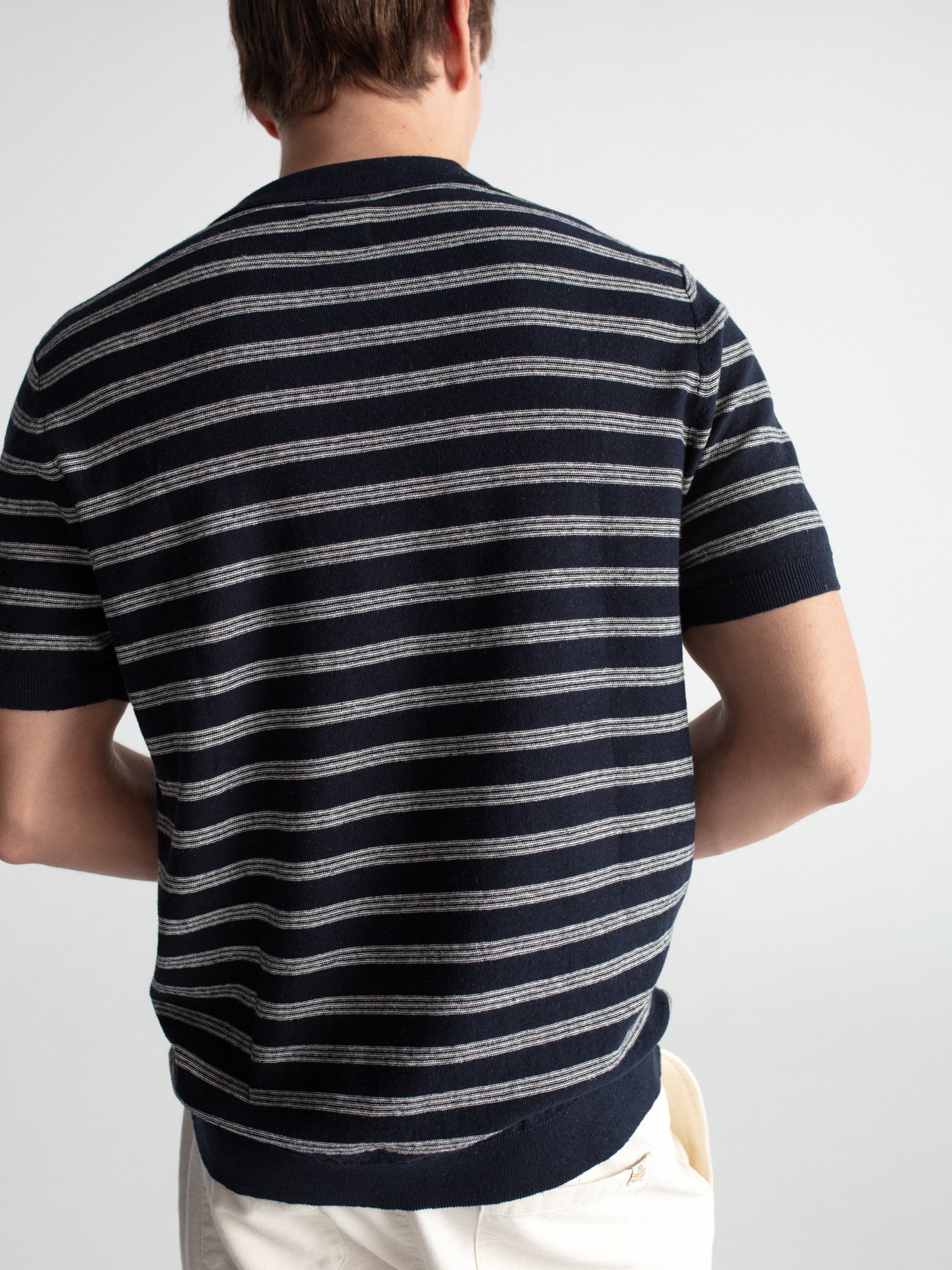 Striped knit polo shirt