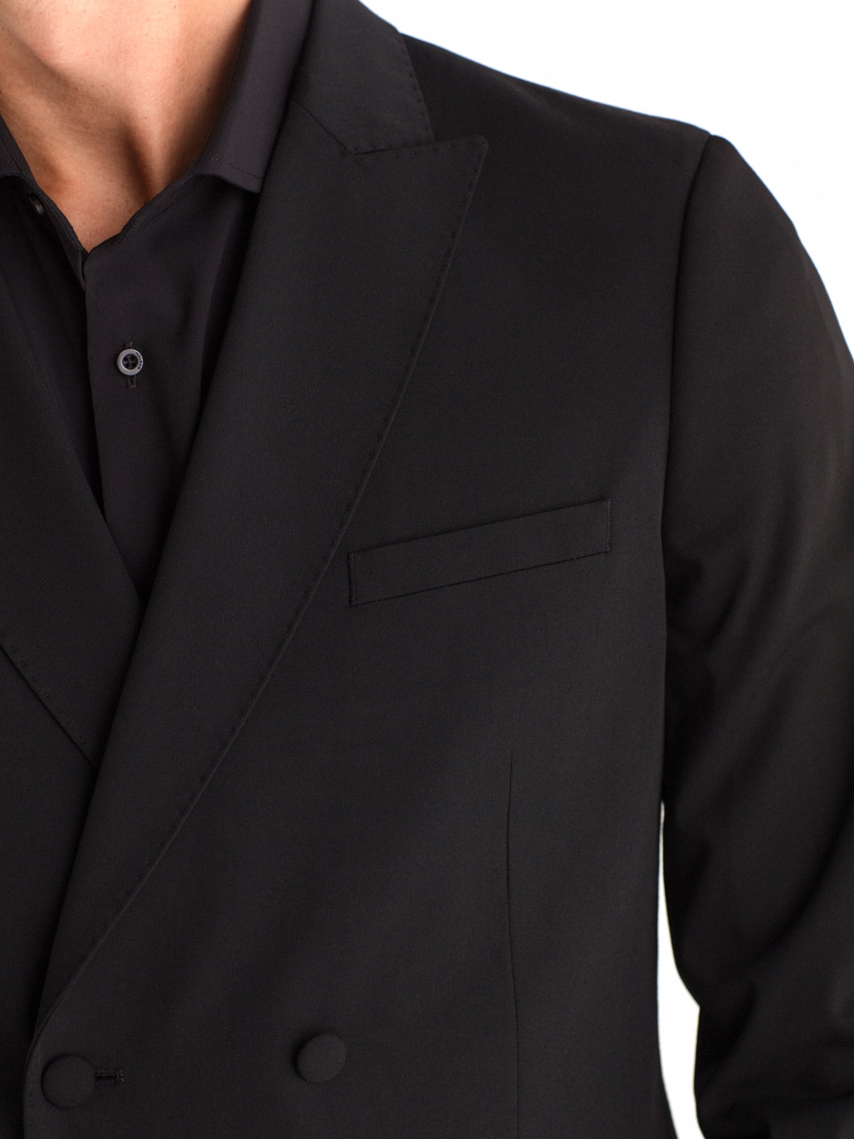 Double-breasted, slim-fit, gala-style suit jacket.