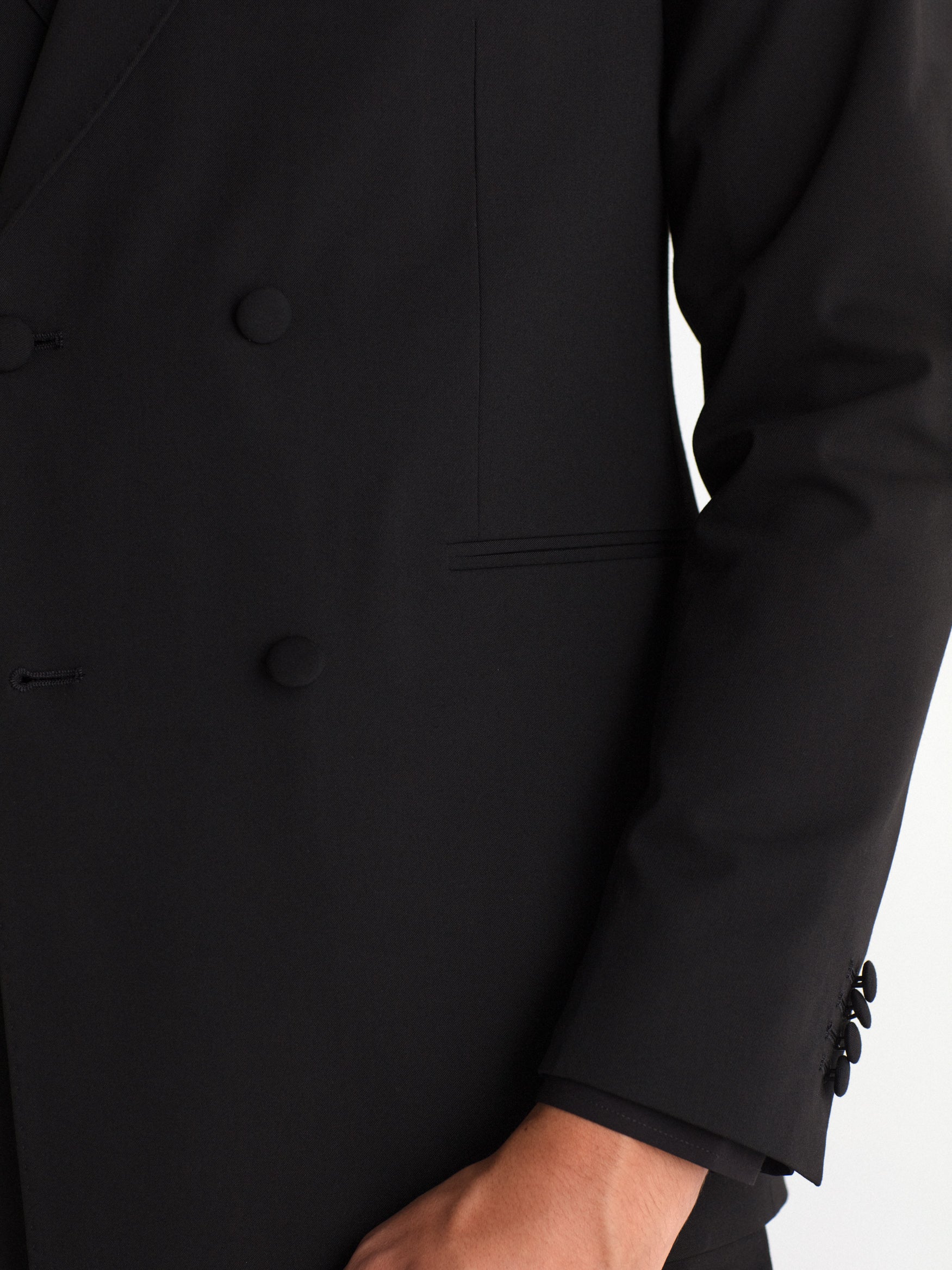 Double-breasted, slim-fit, gala-style suit jacket.
