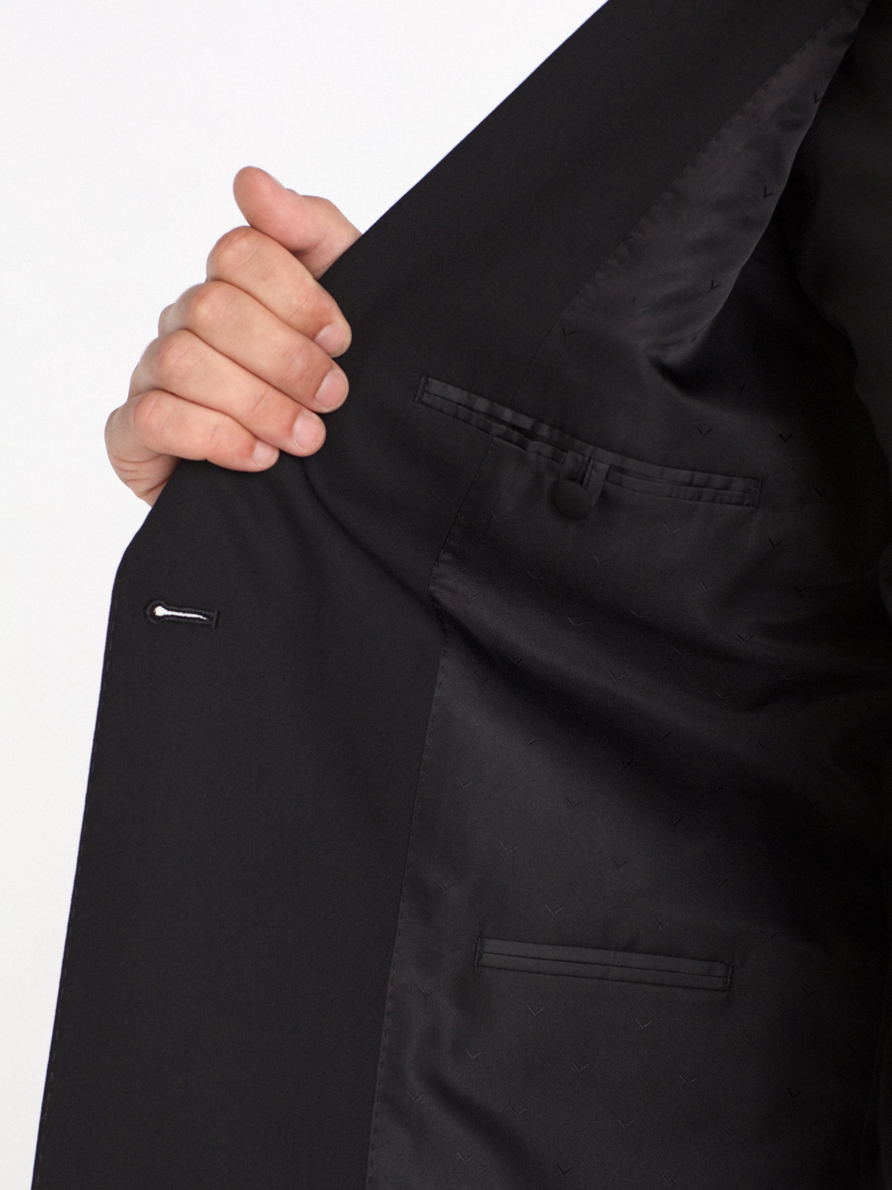 Double-breasted, slim-fit, gala-style suit jacket.