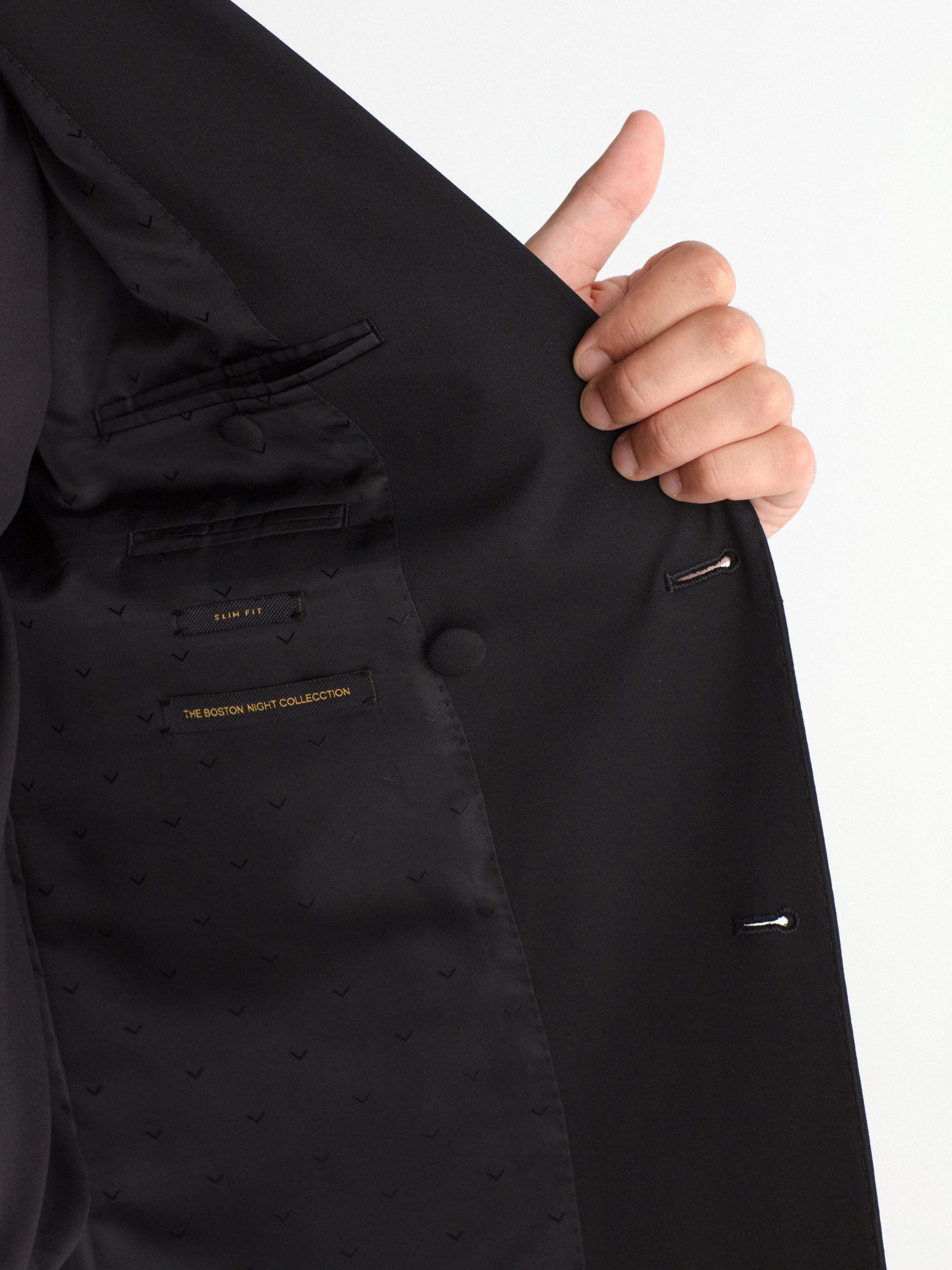 Double-breasted, slim-fit, gala-style suit jacket.