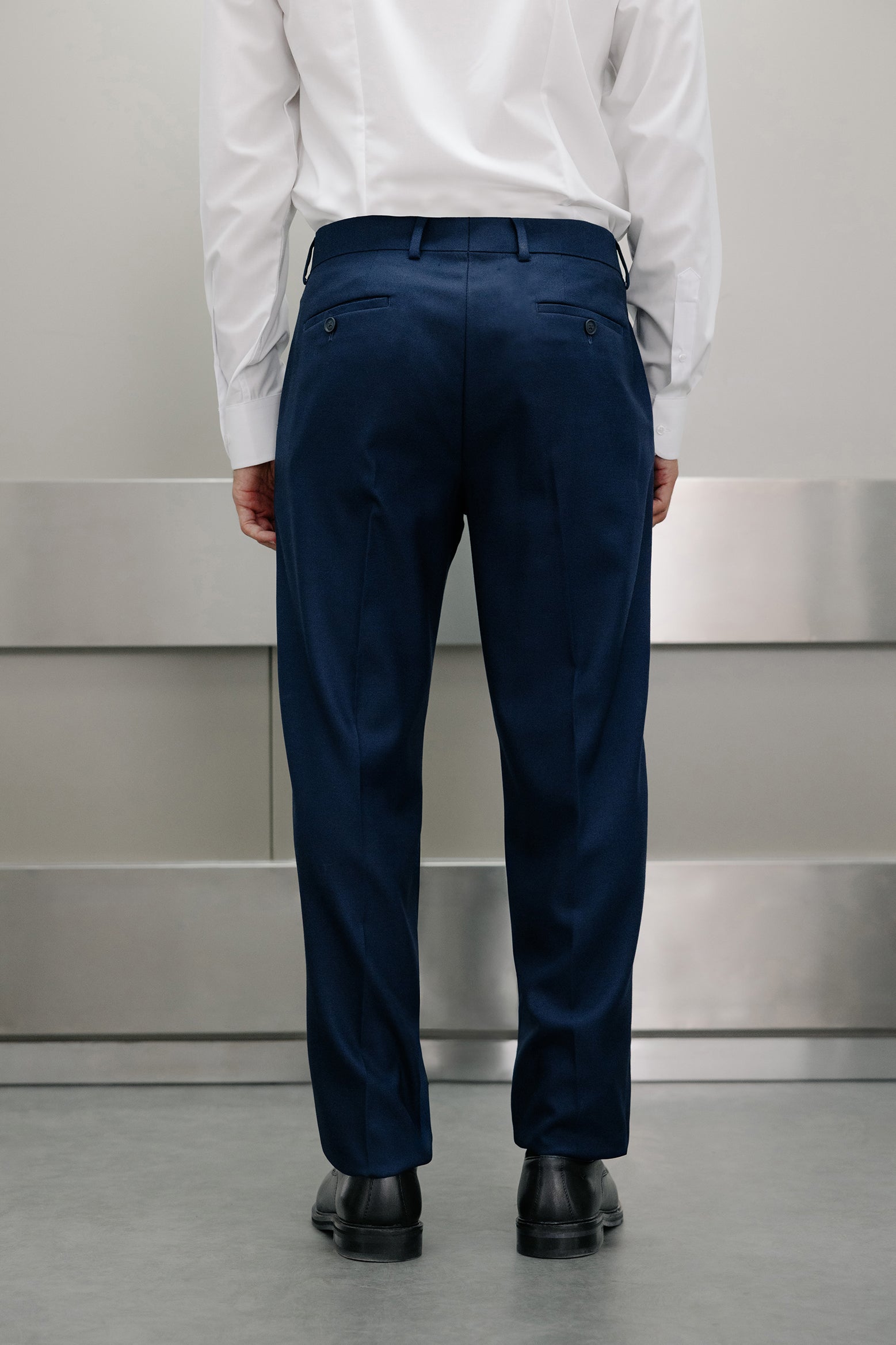 Pantalón traje falso liso
