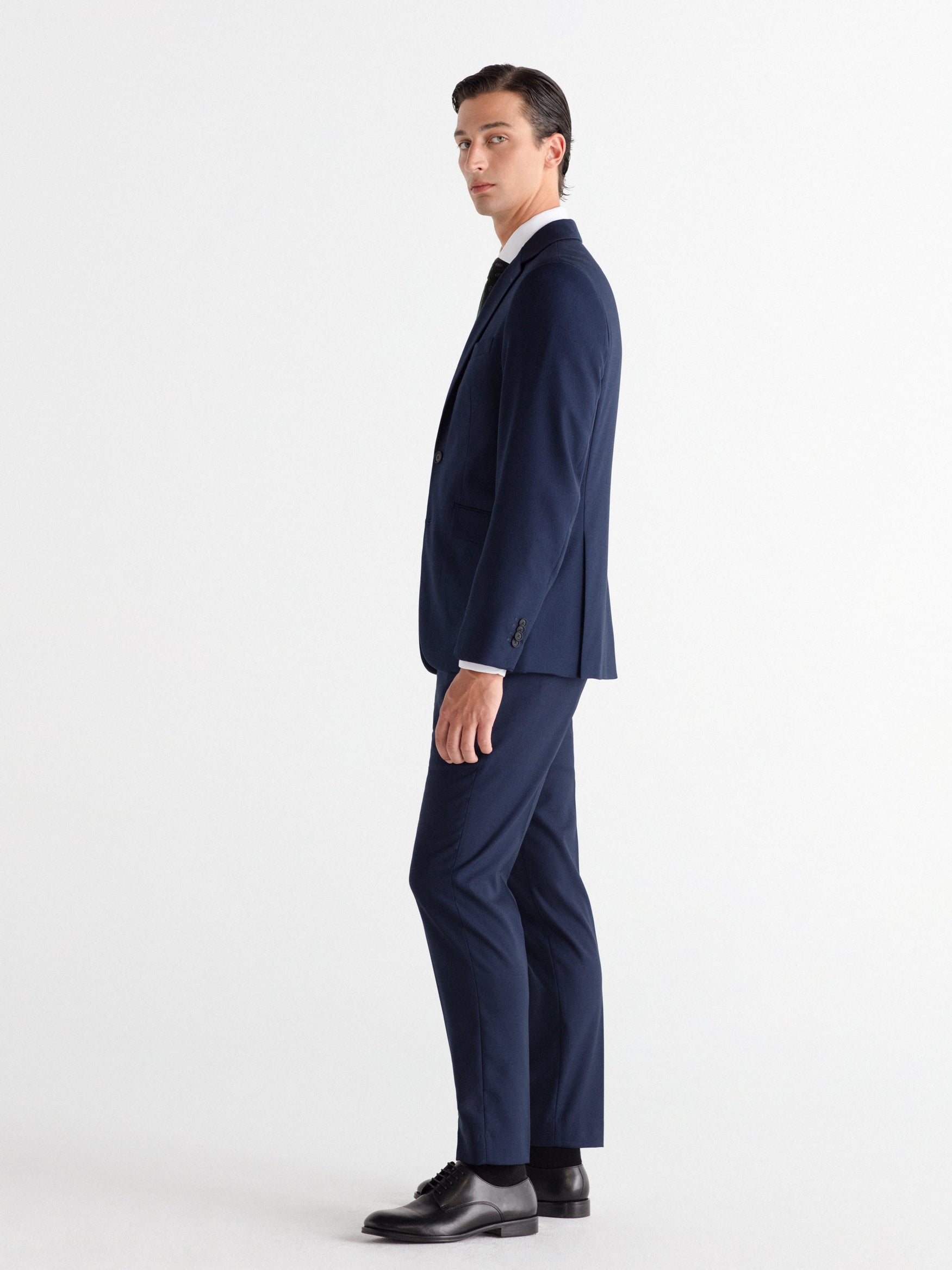 Pantalón traje falso liso