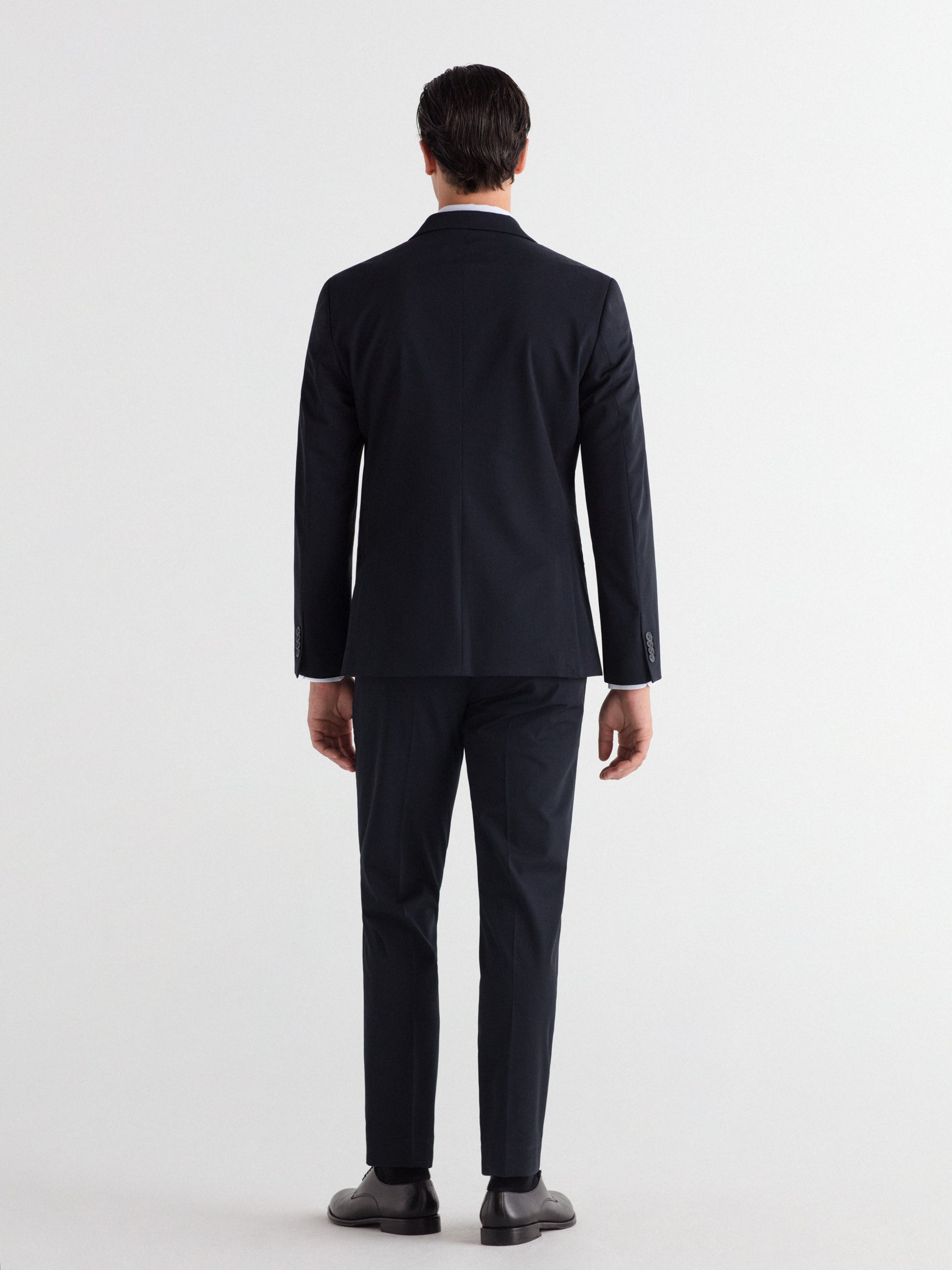 Pantalón traje slim fit liso