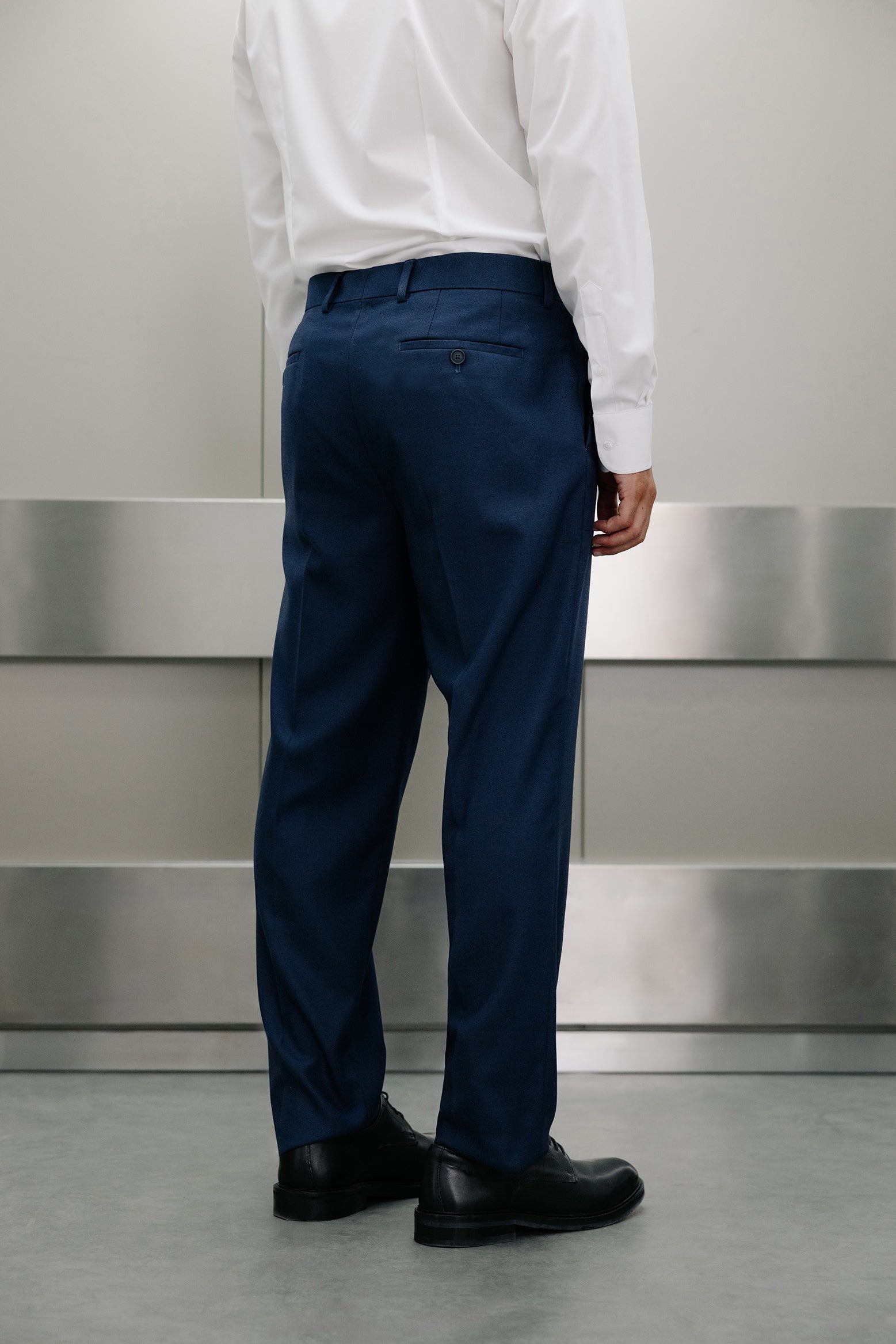 Pantalón traje falso liso