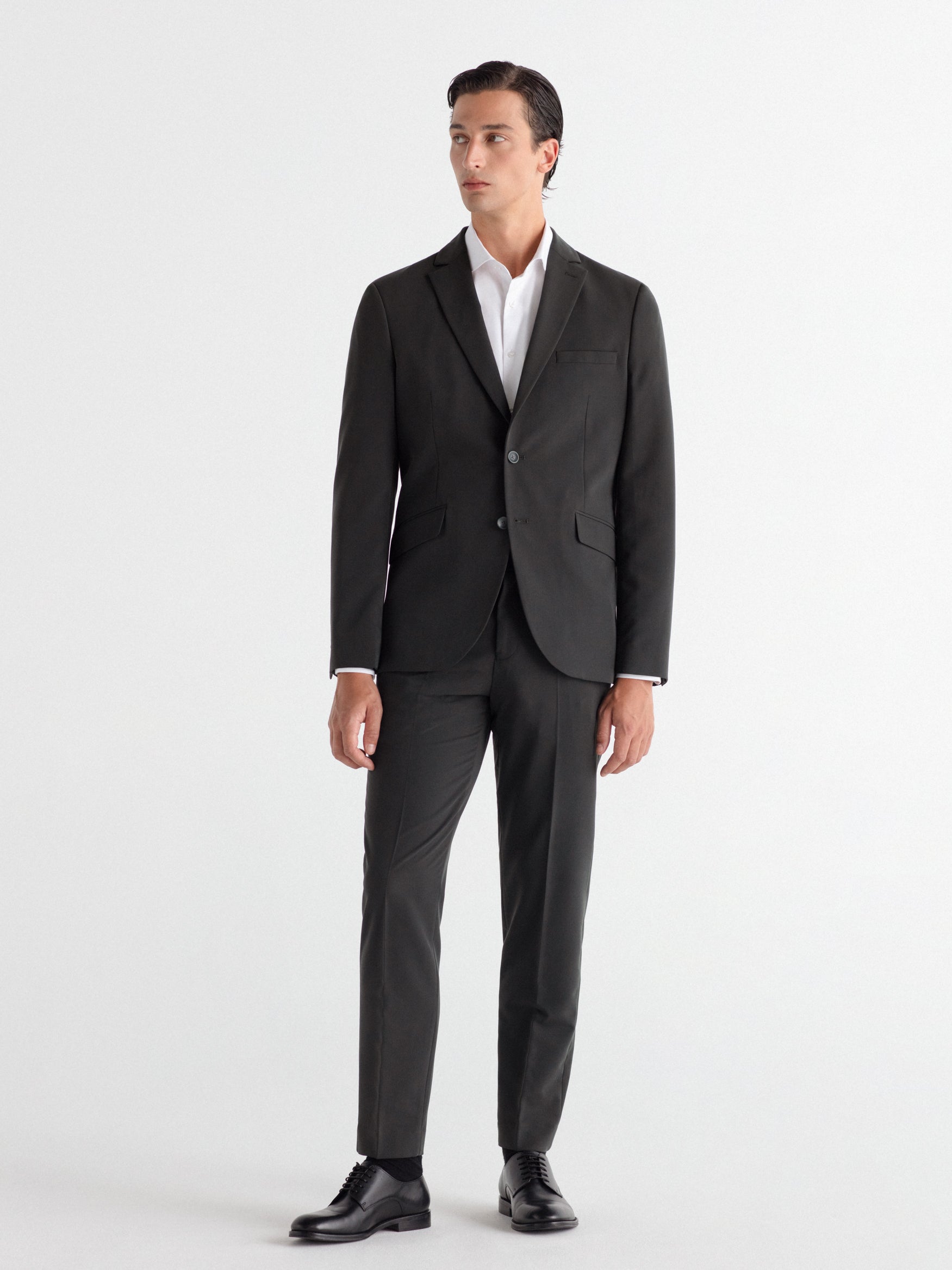 Pantalón traje slim fit liso