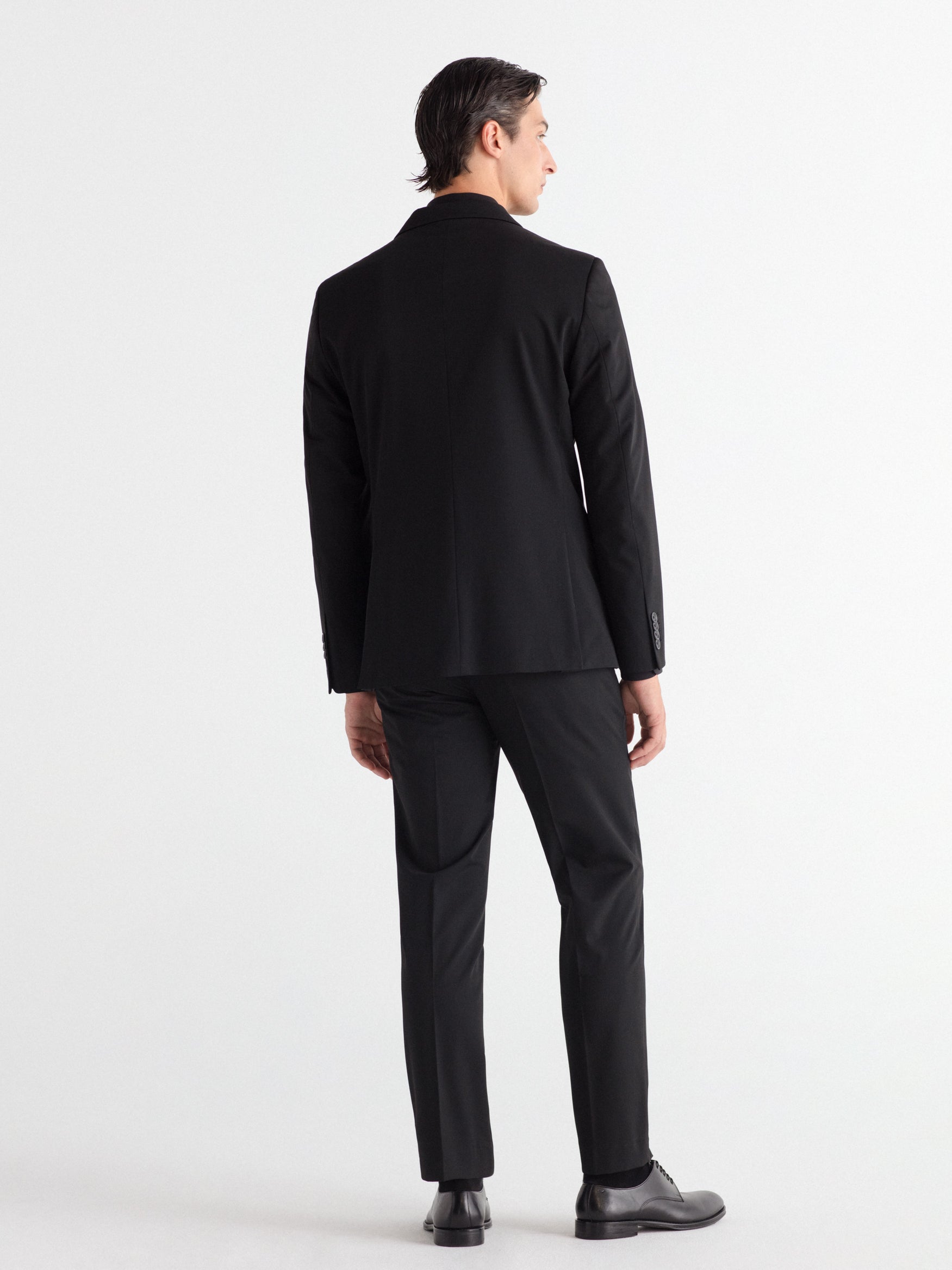 Pantalón traje slim fit liso