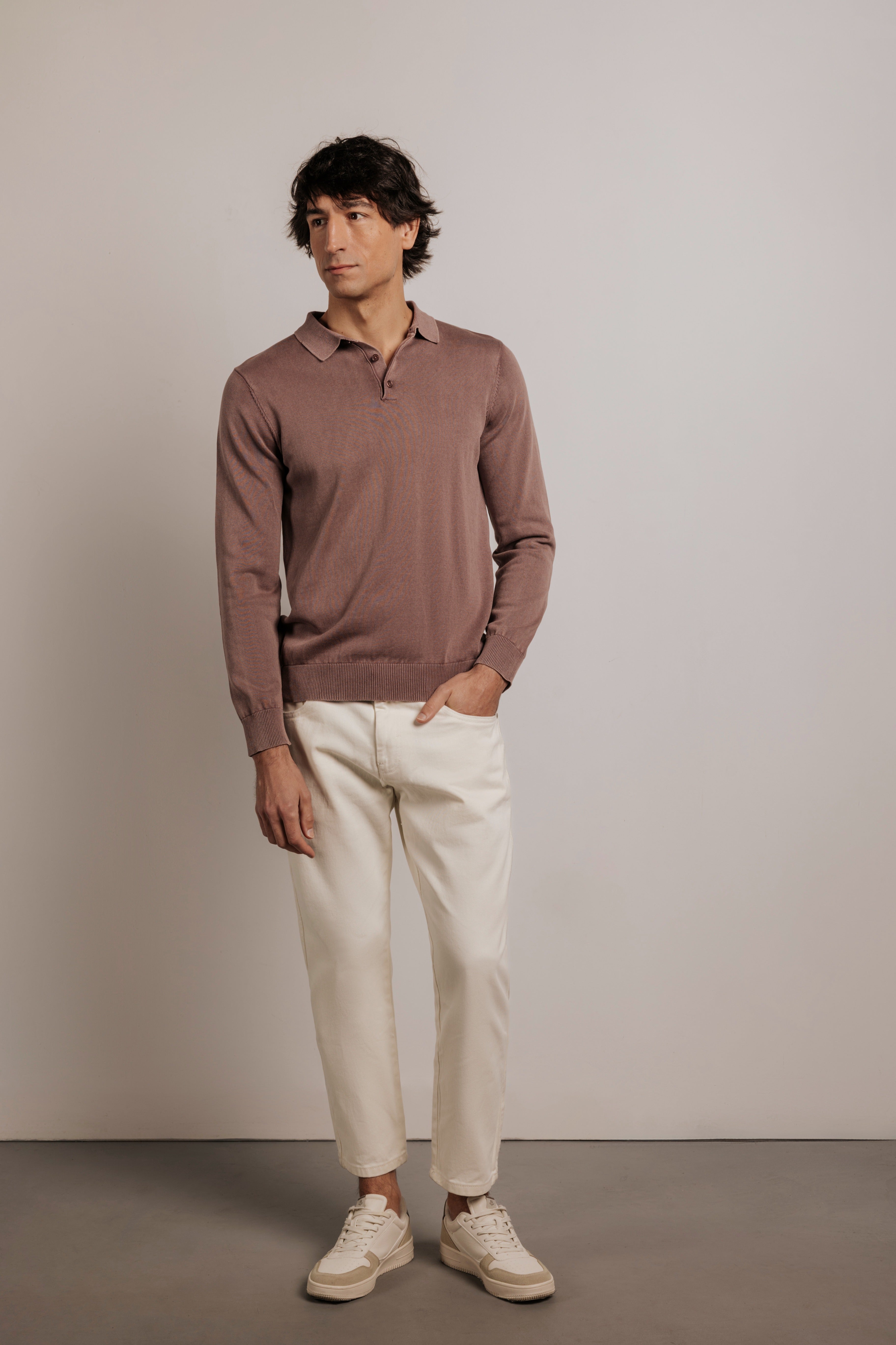 Acid-washed knitted polo shirt