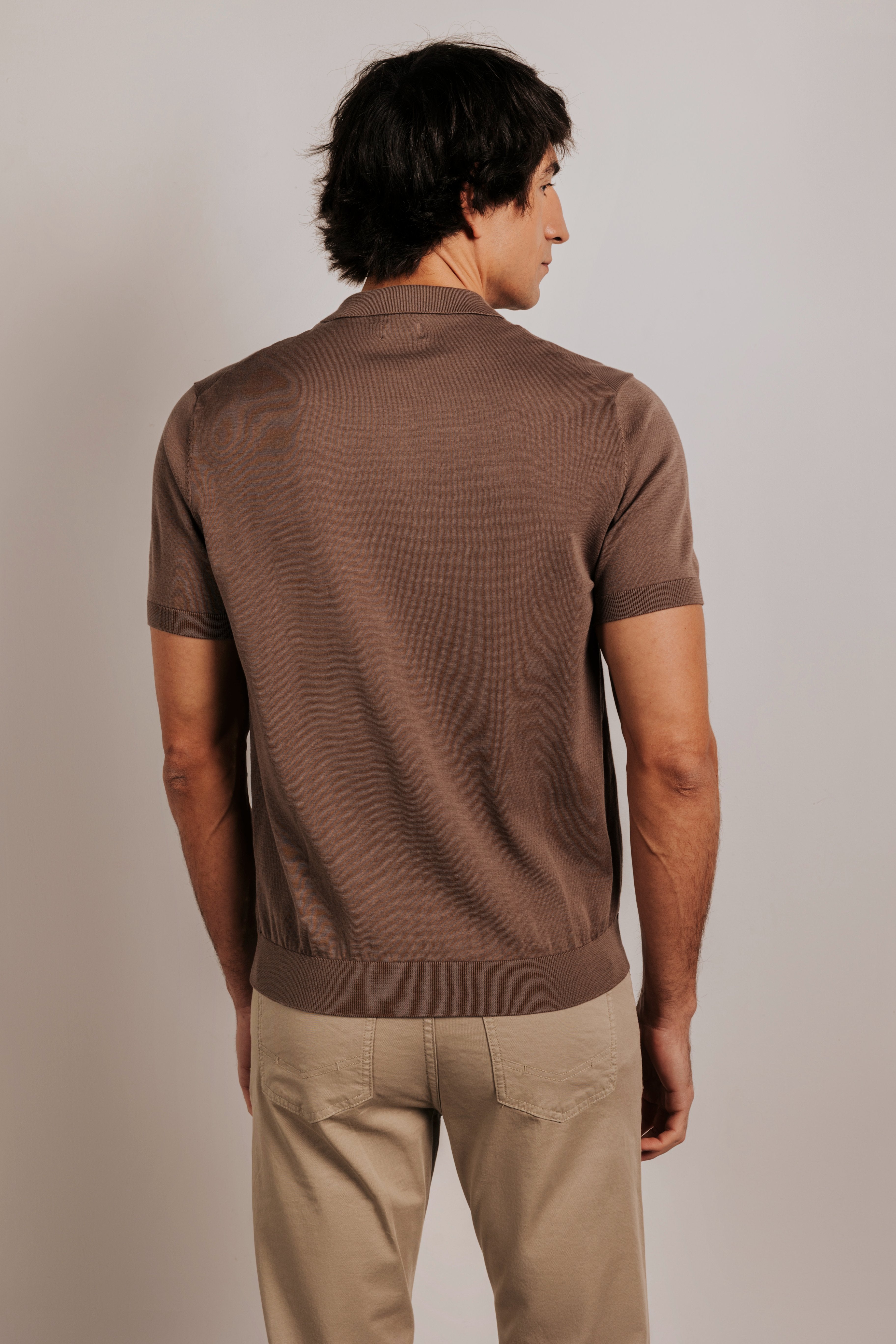 Buttonless knit polo shirt