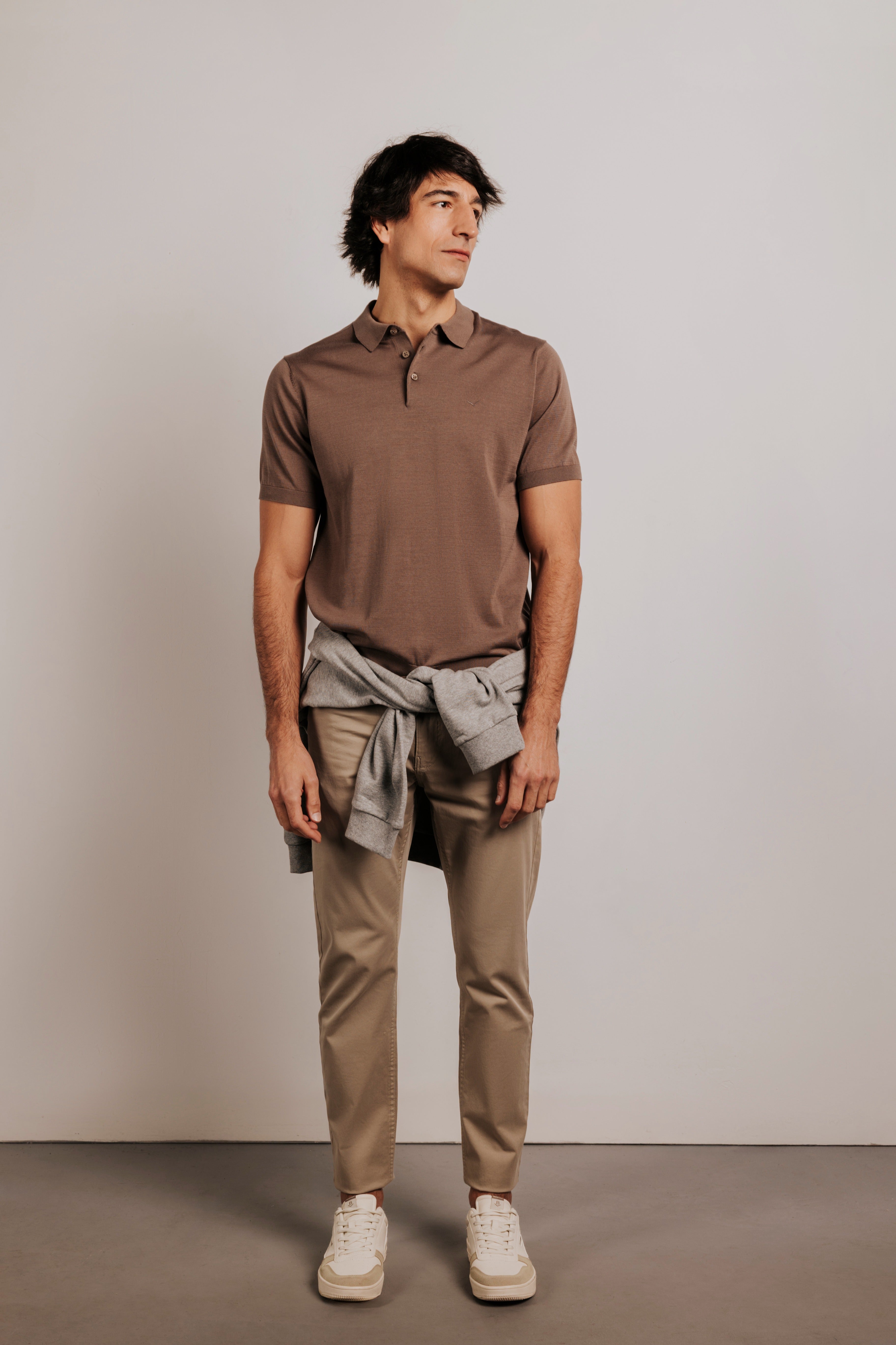 Buttonless knit polo shirt