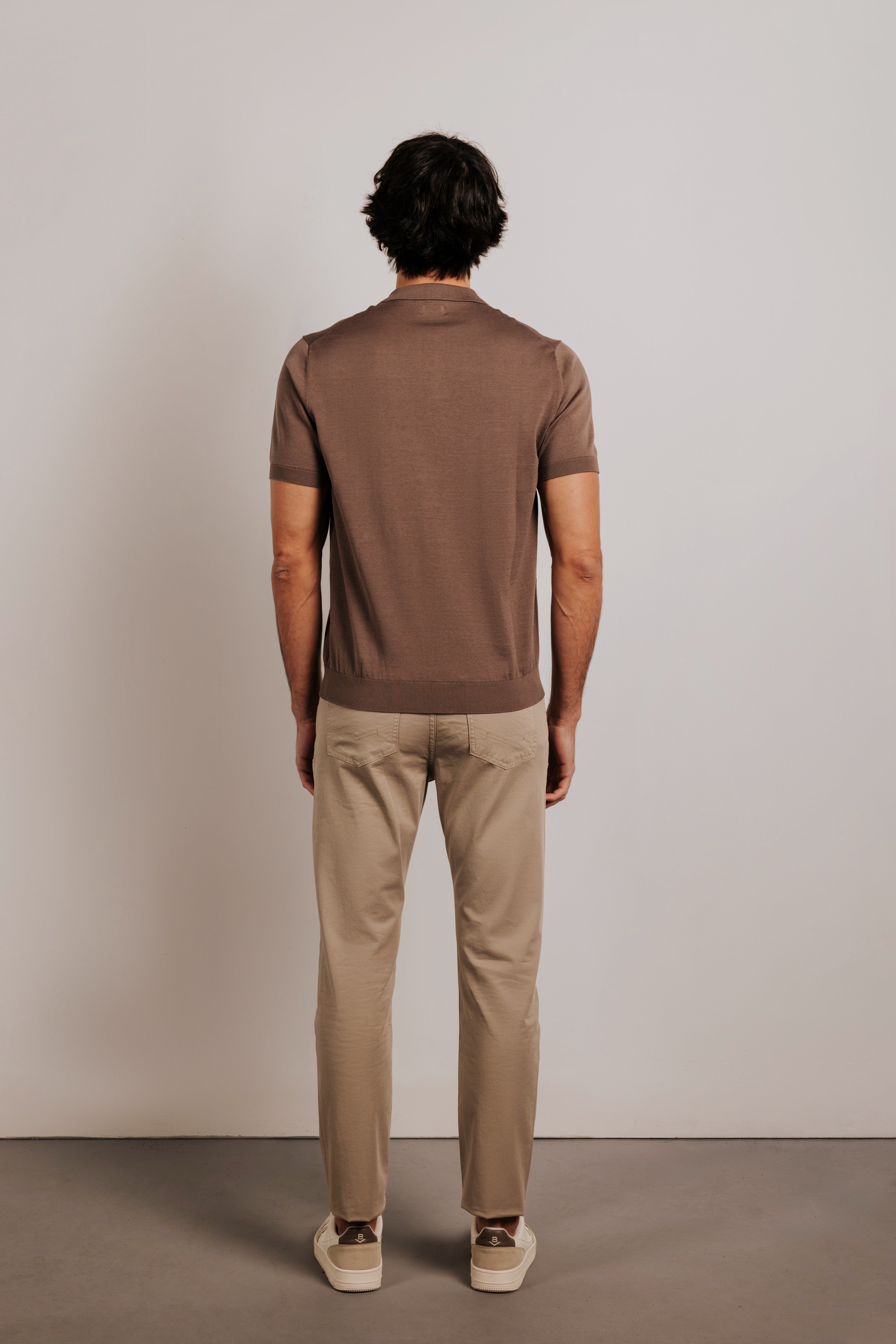 Buttonless knit polo shirt