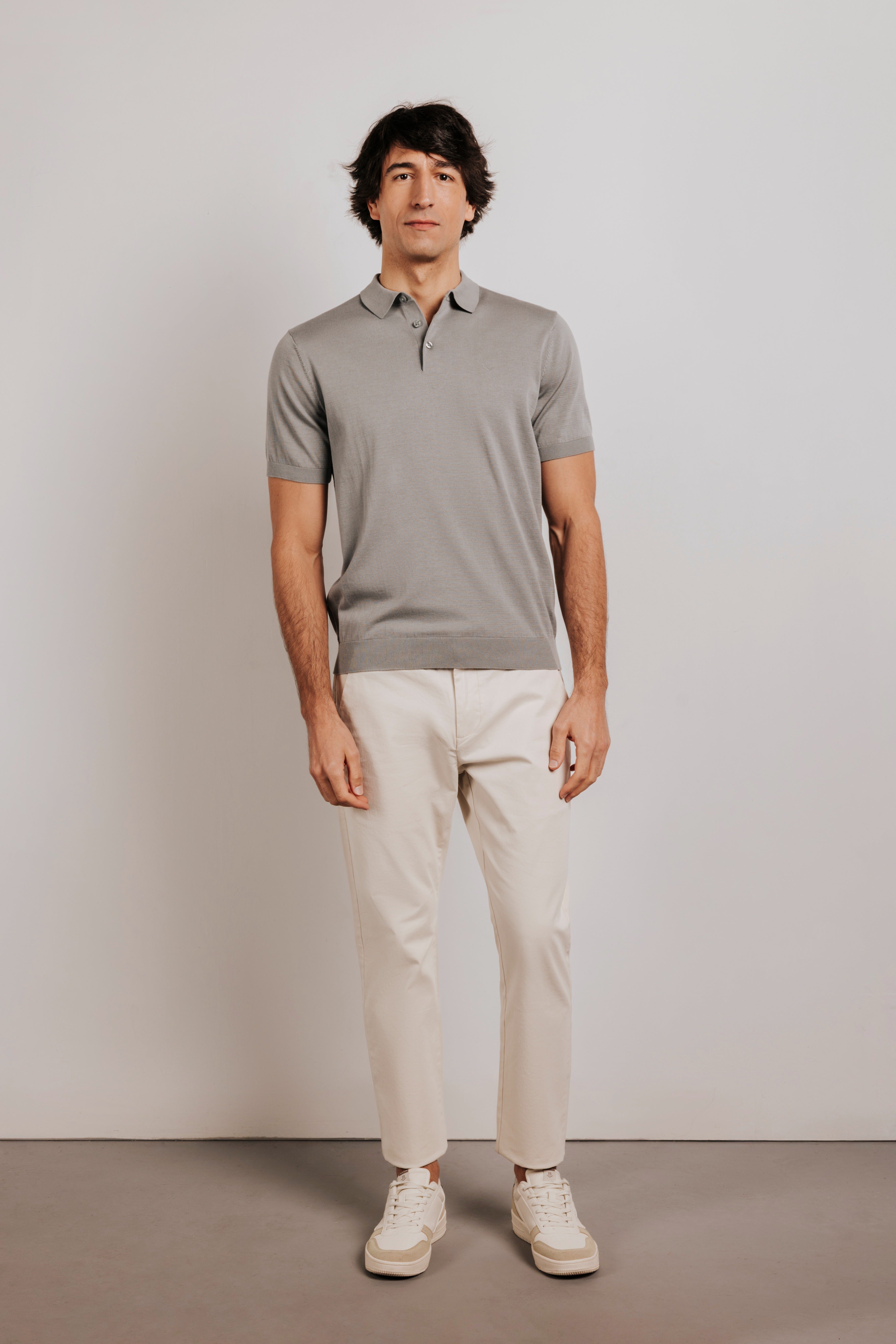 Buttonless knit polo shirt