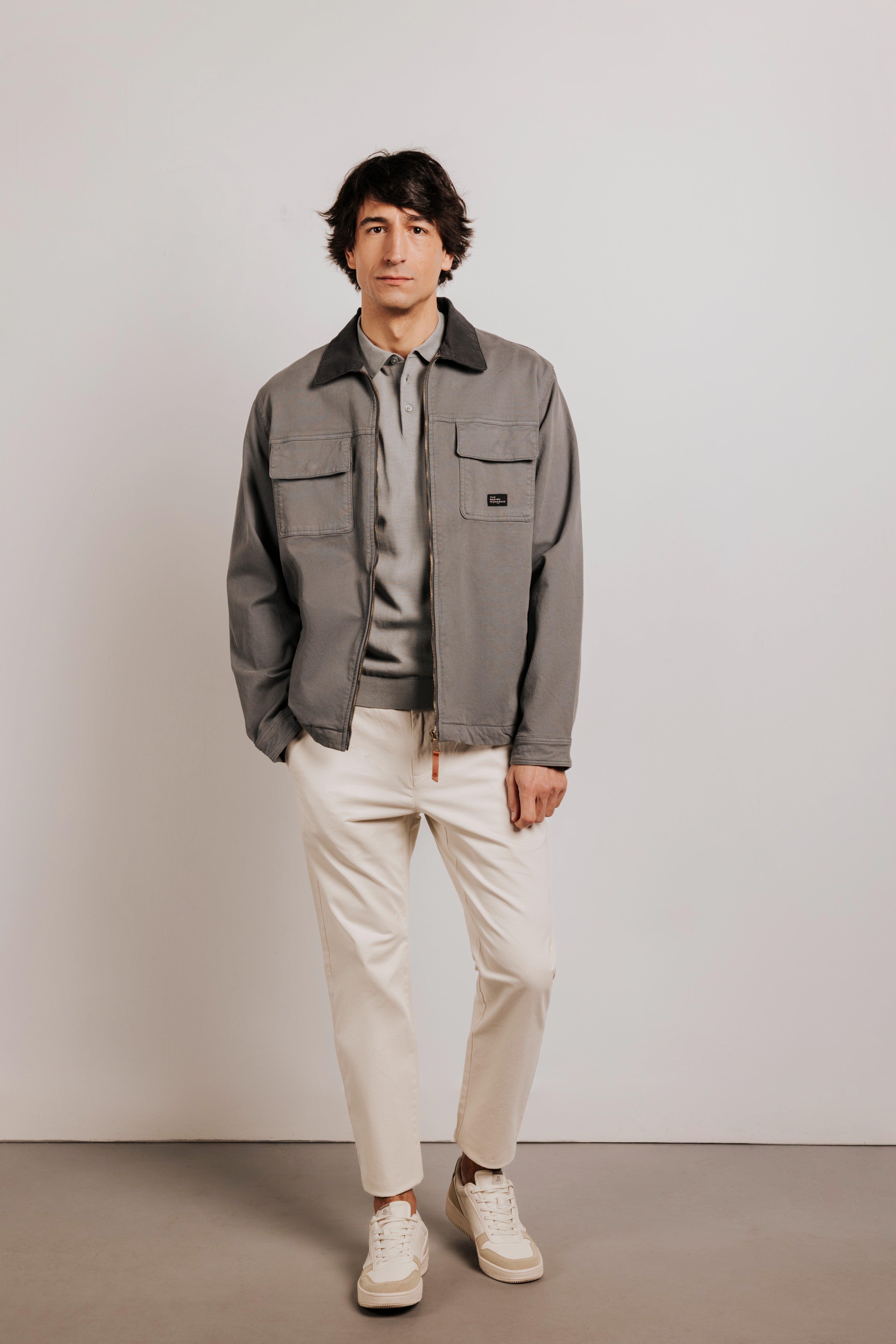 Buttonless knit polo shirt