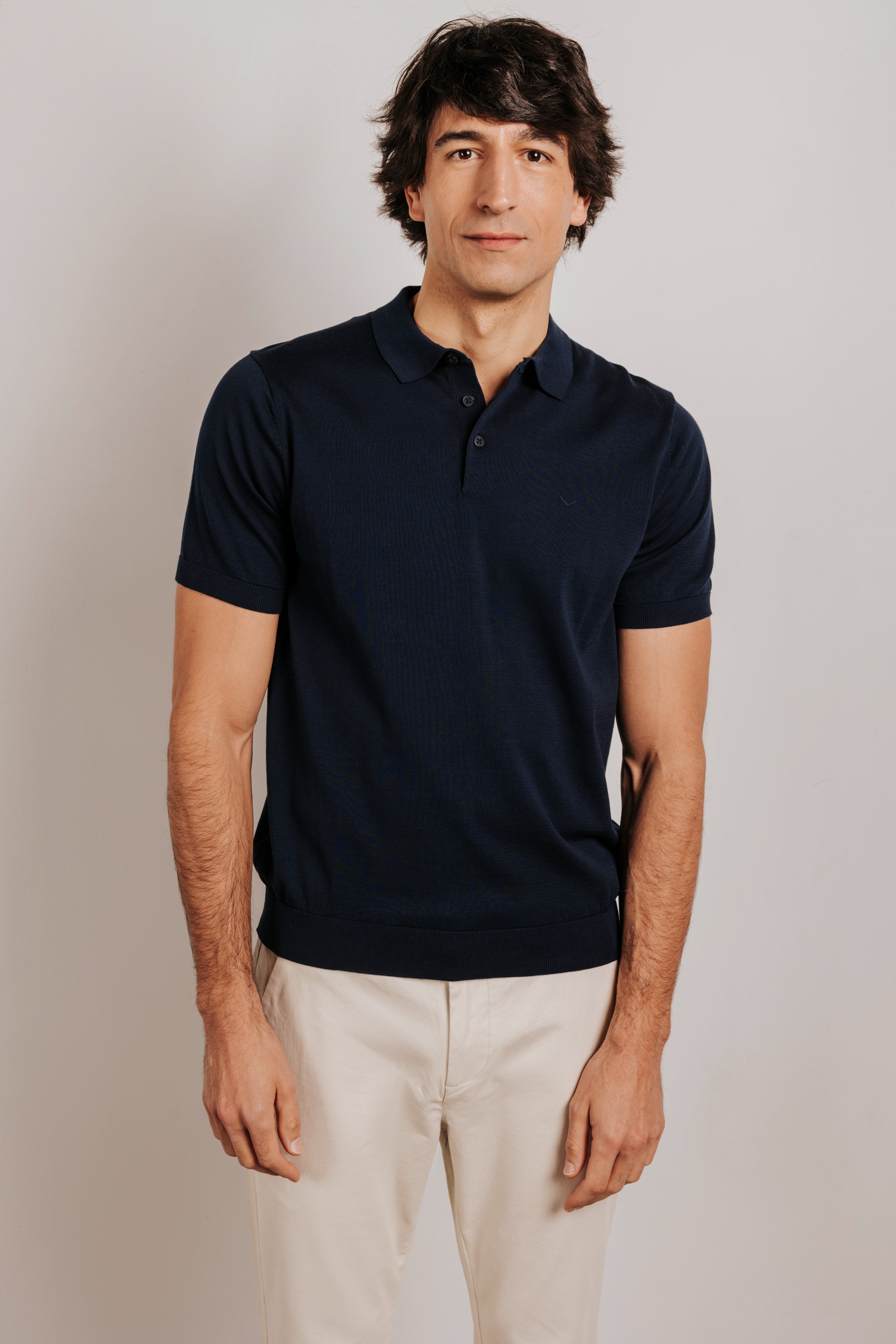 Buttonless knit polo shirt