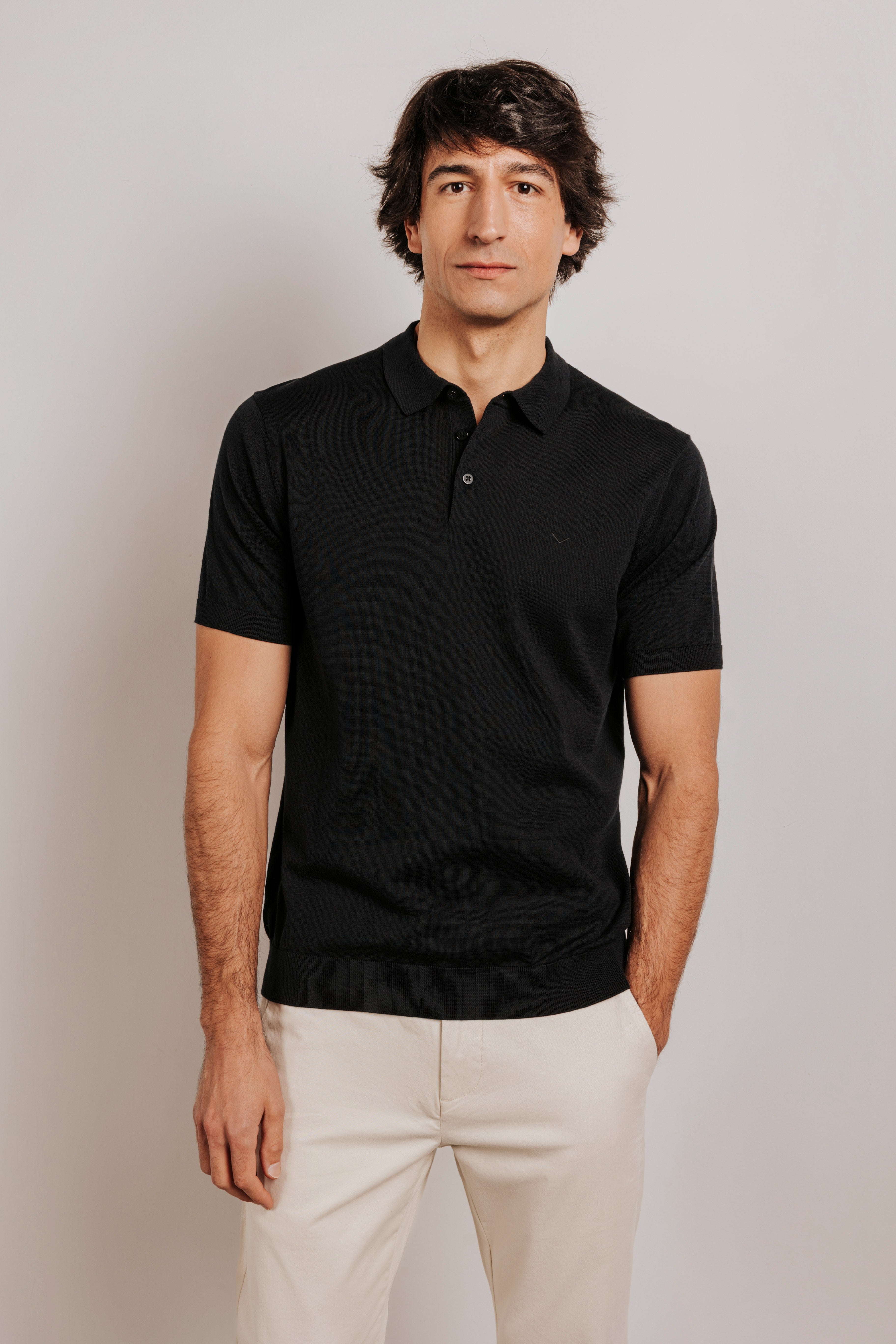 Buttonless knit polo shirt