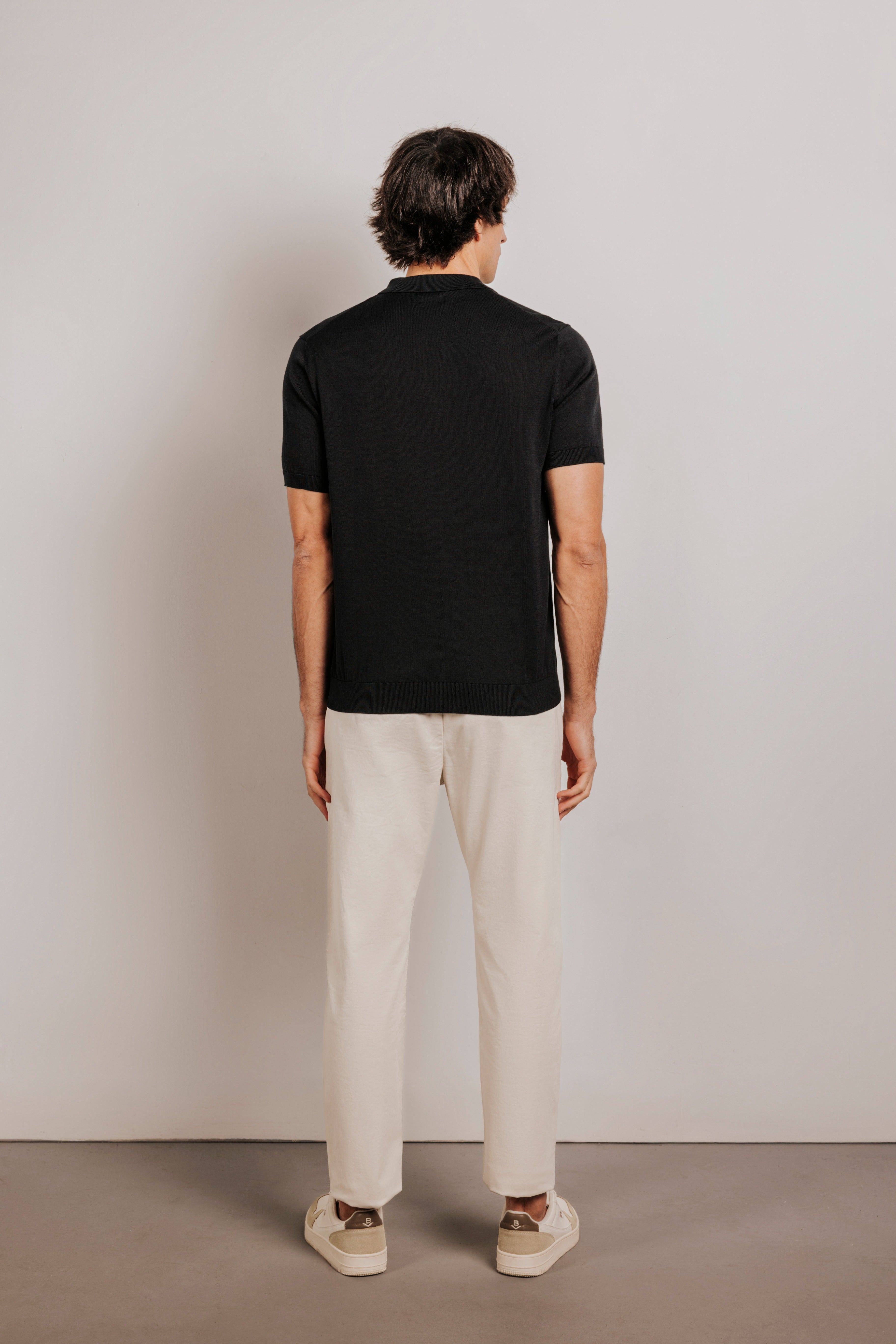 Buttonless knit polo shirt