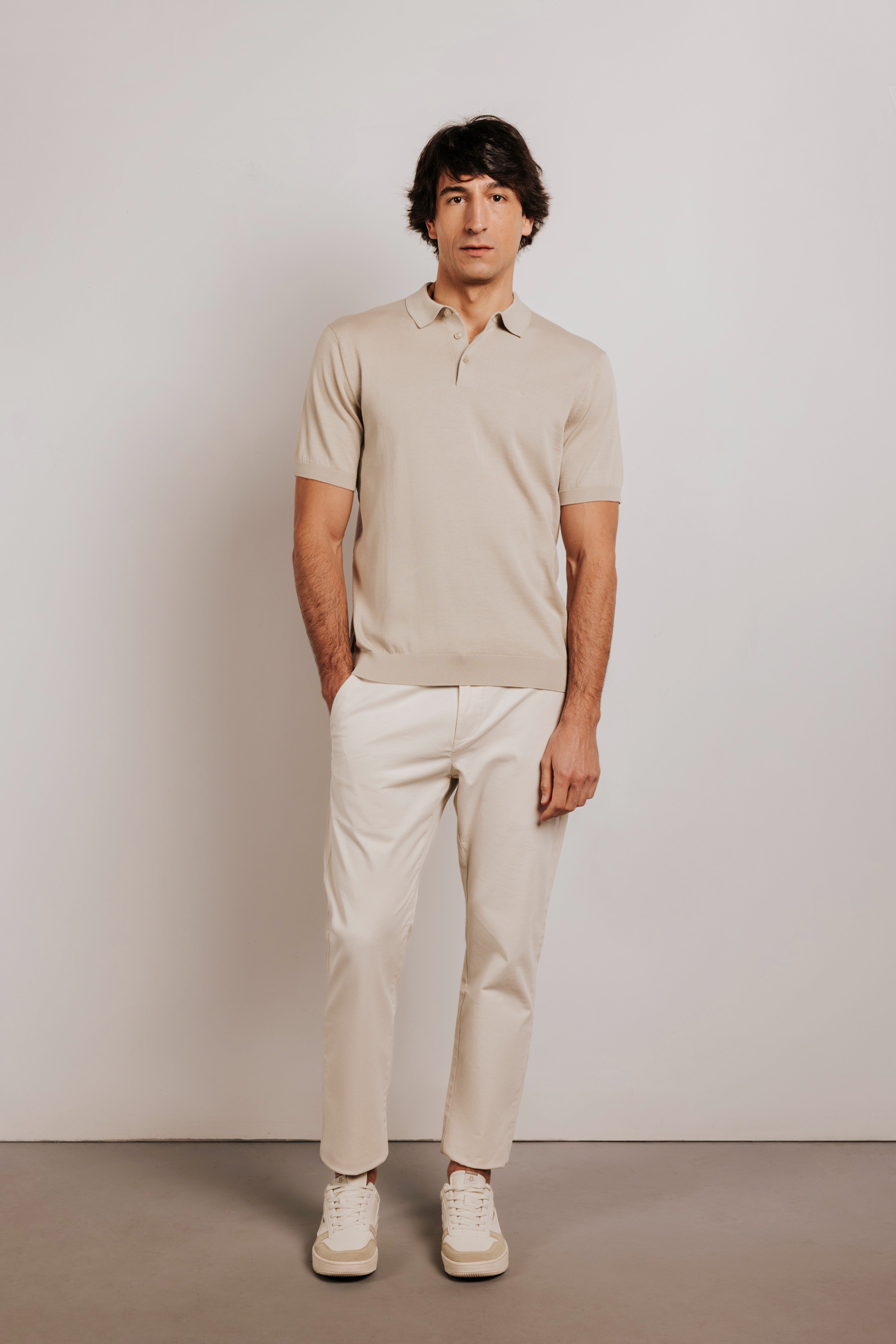 Buttonless knit polo shirt