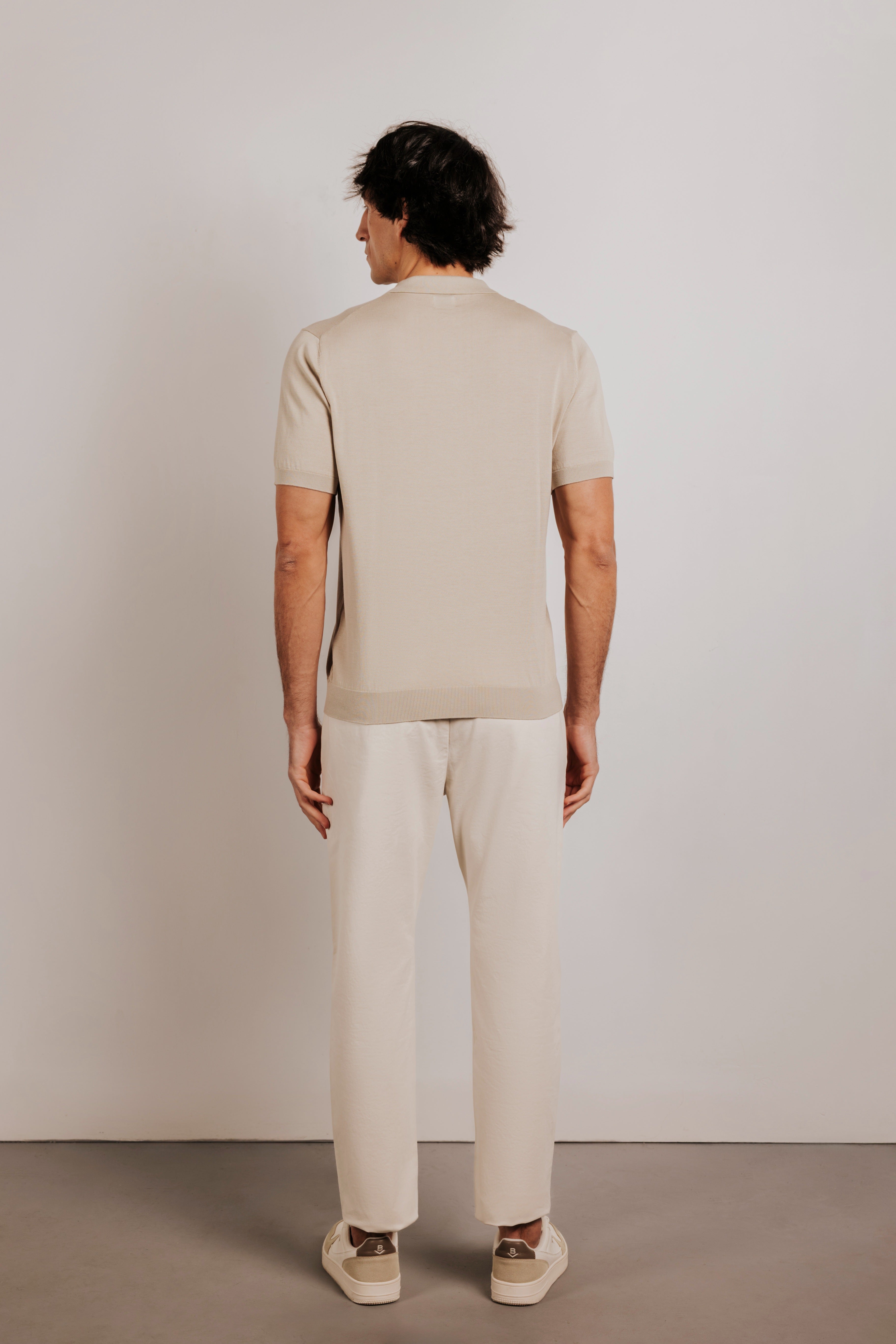 Buttonless knit polo shirt