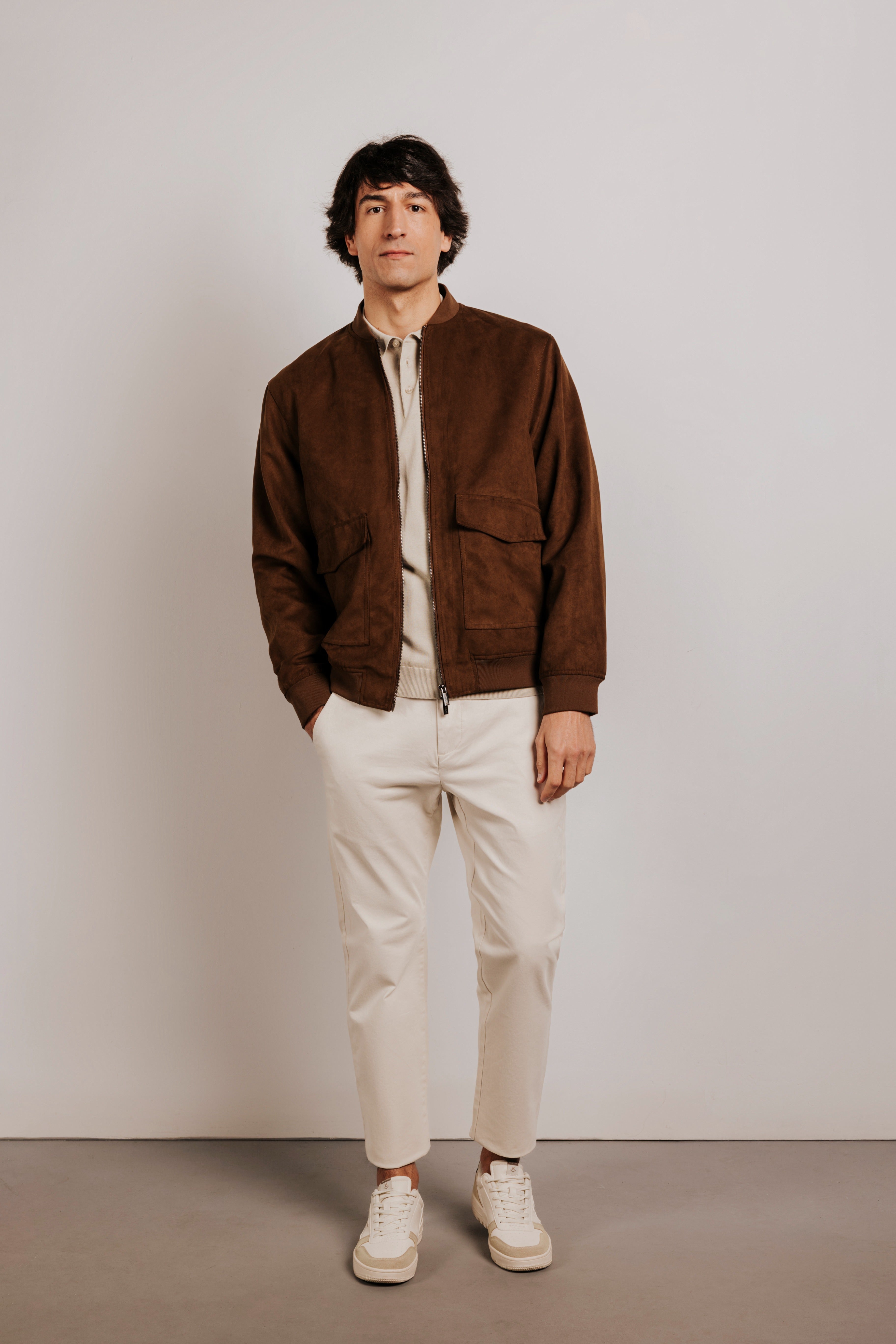 Buttonless knit polo shirt