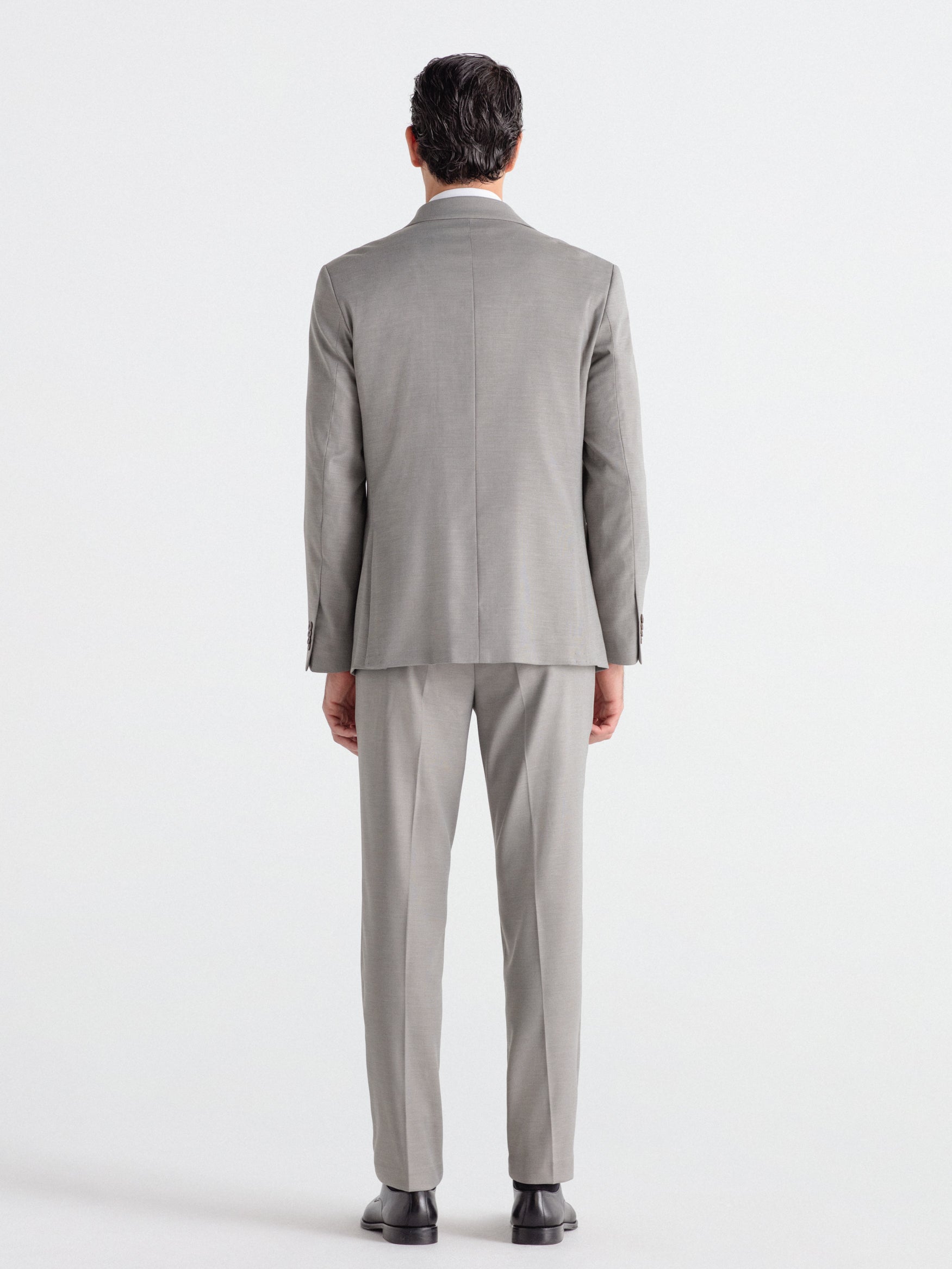 Pantalón traje falso liso