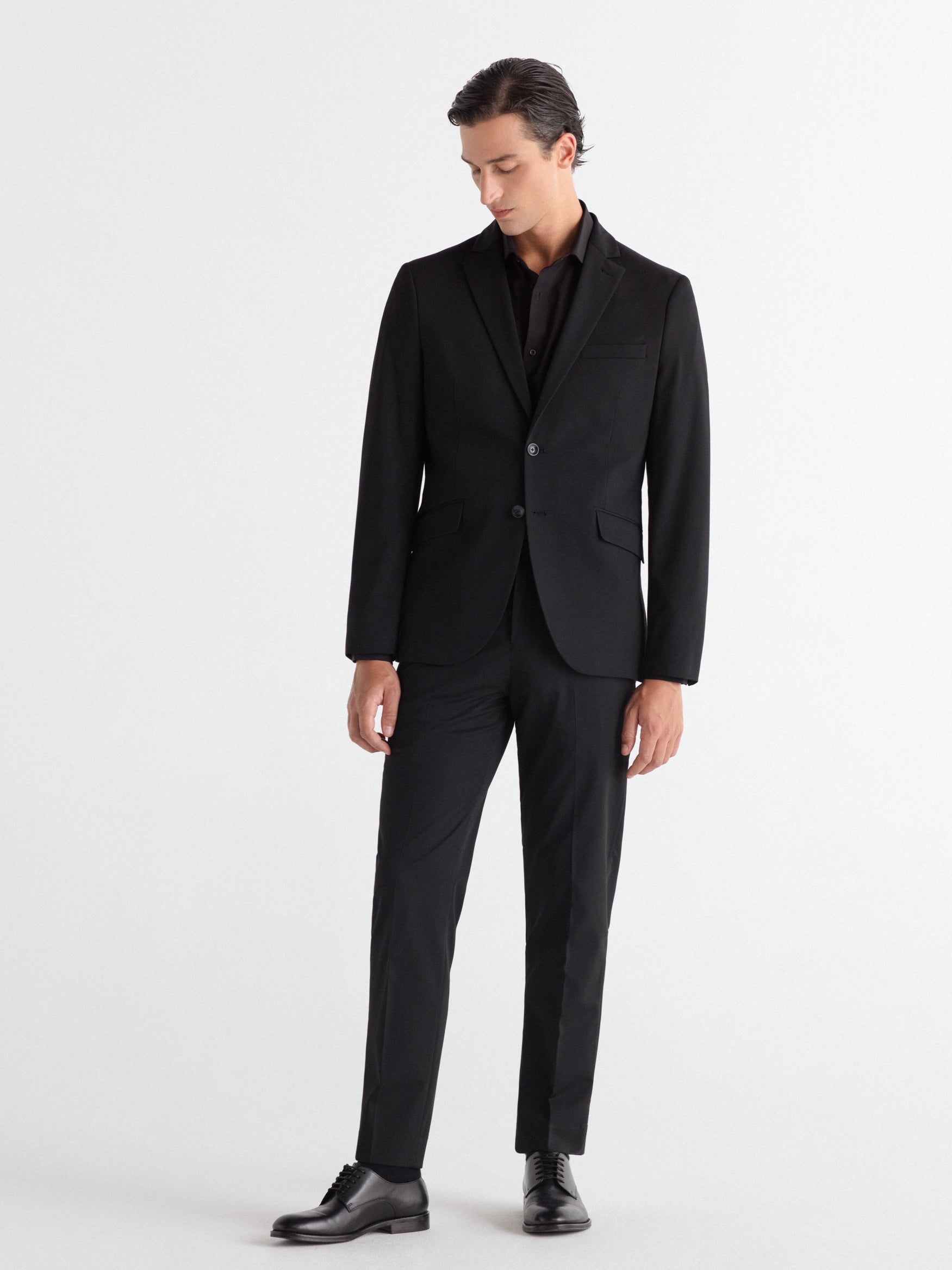 Pantalón traje slim fit liso