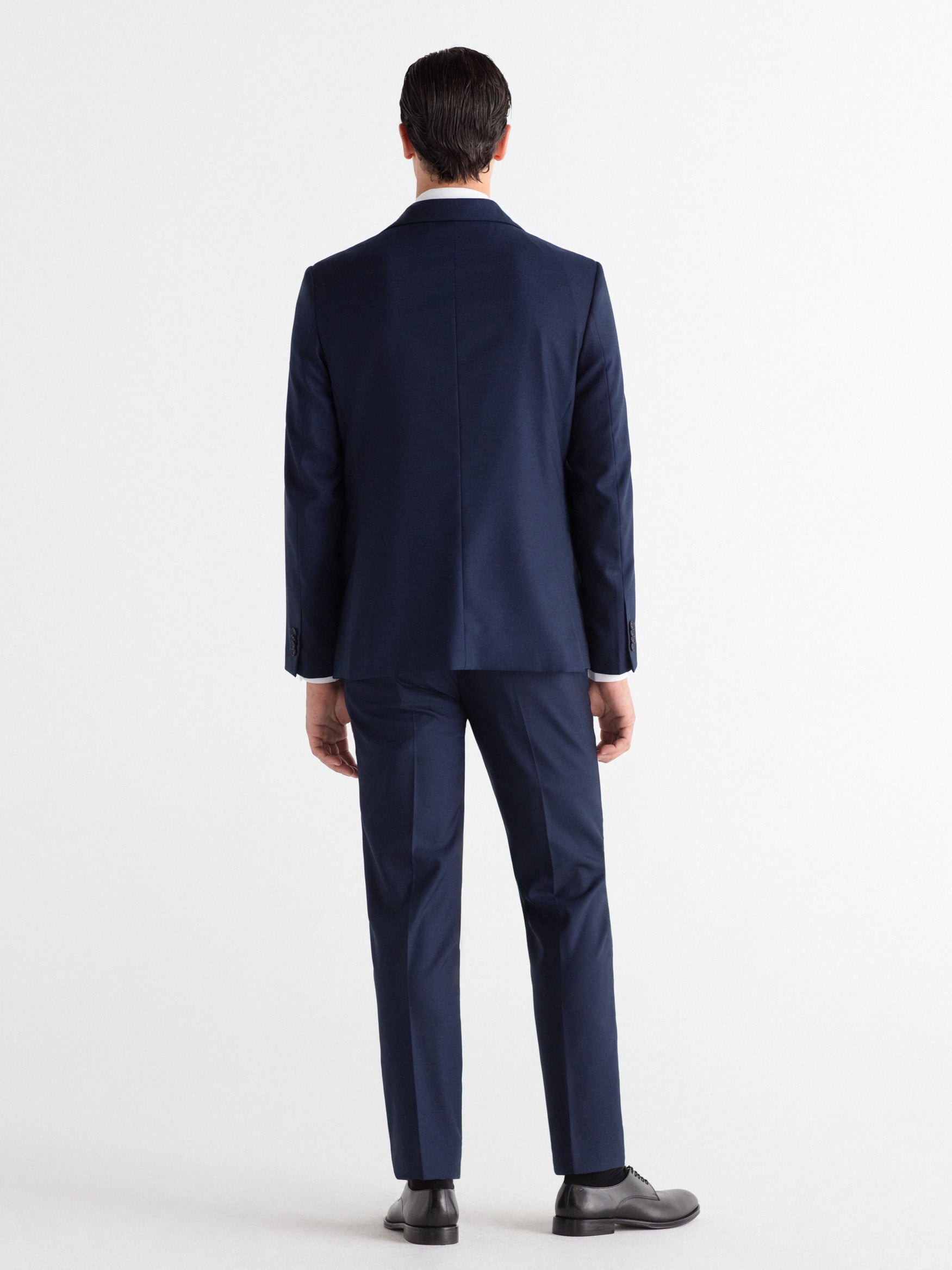 Pantalón traje falso liso