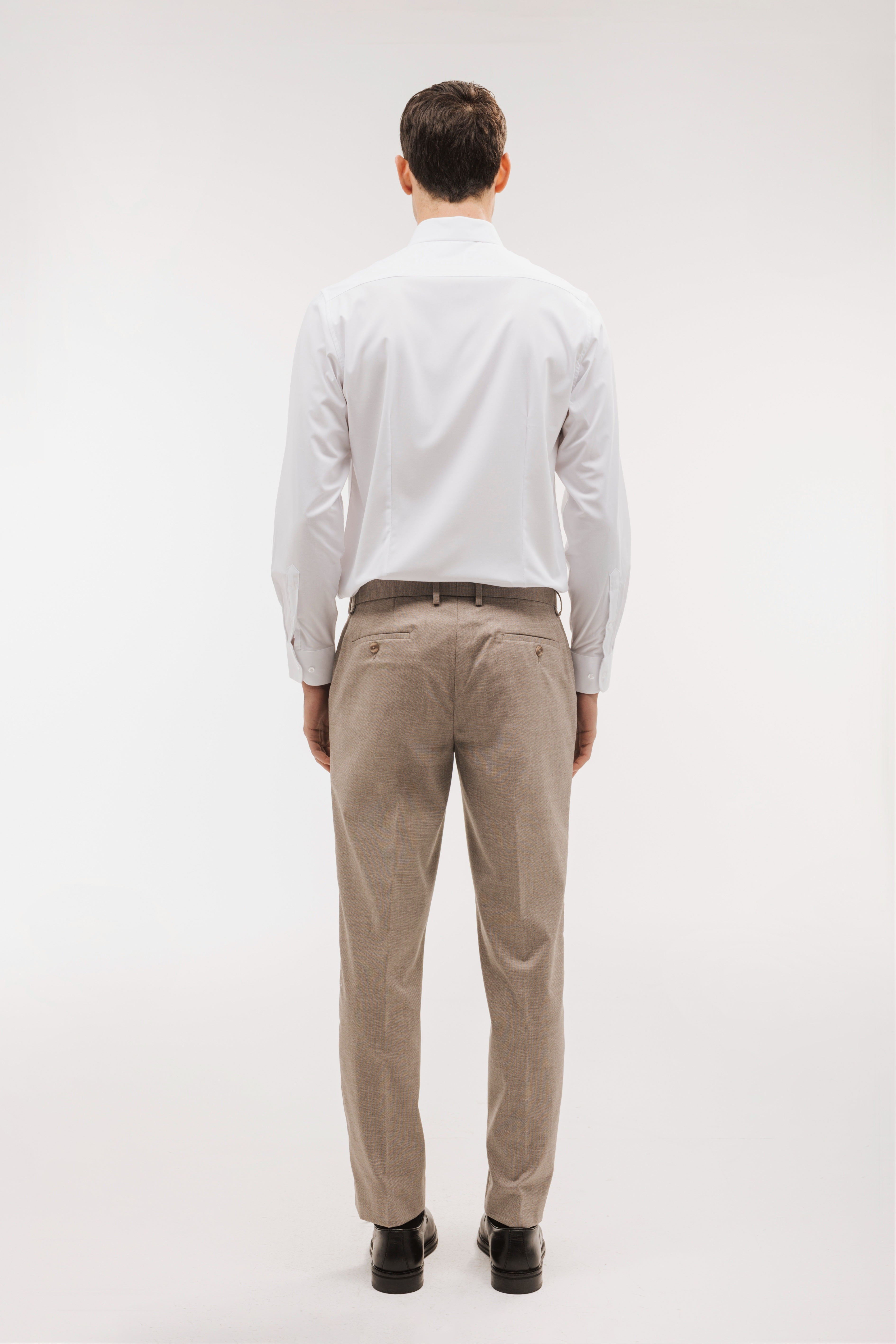 Pantalón traje slim fit falso liso