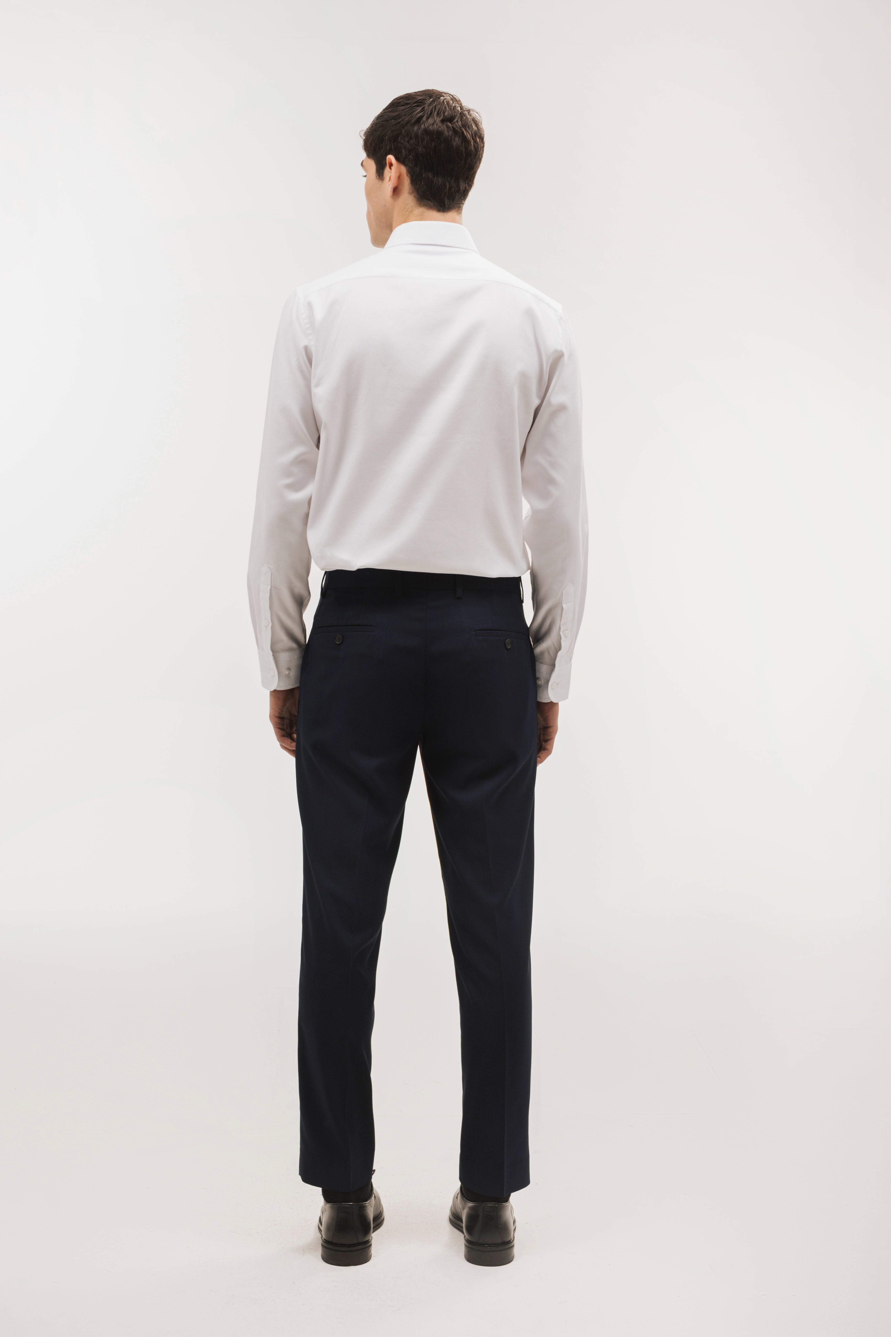 Pantalón traje slim fit falso liso