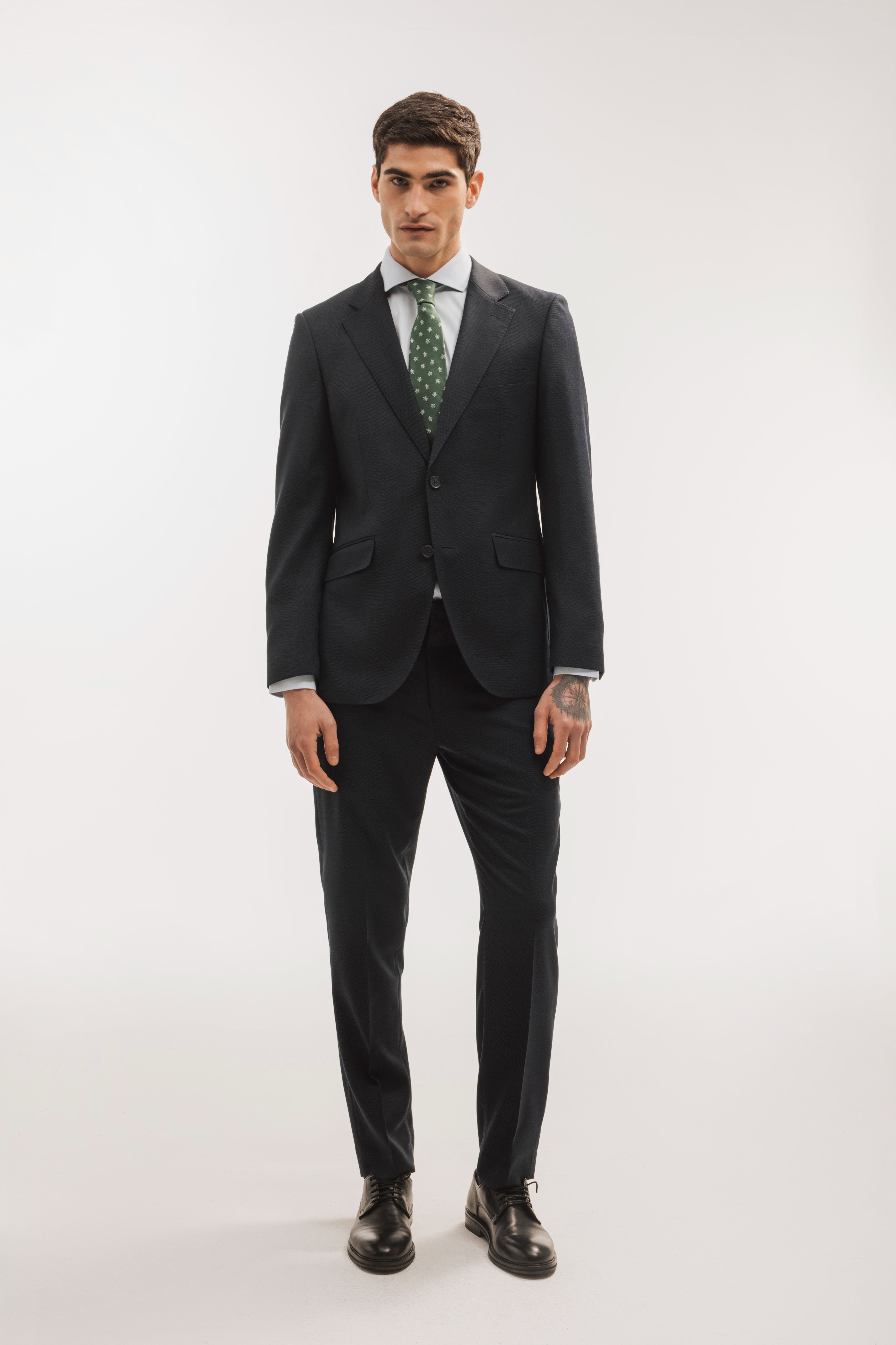 Pantalón traje lana slim fit falso liso