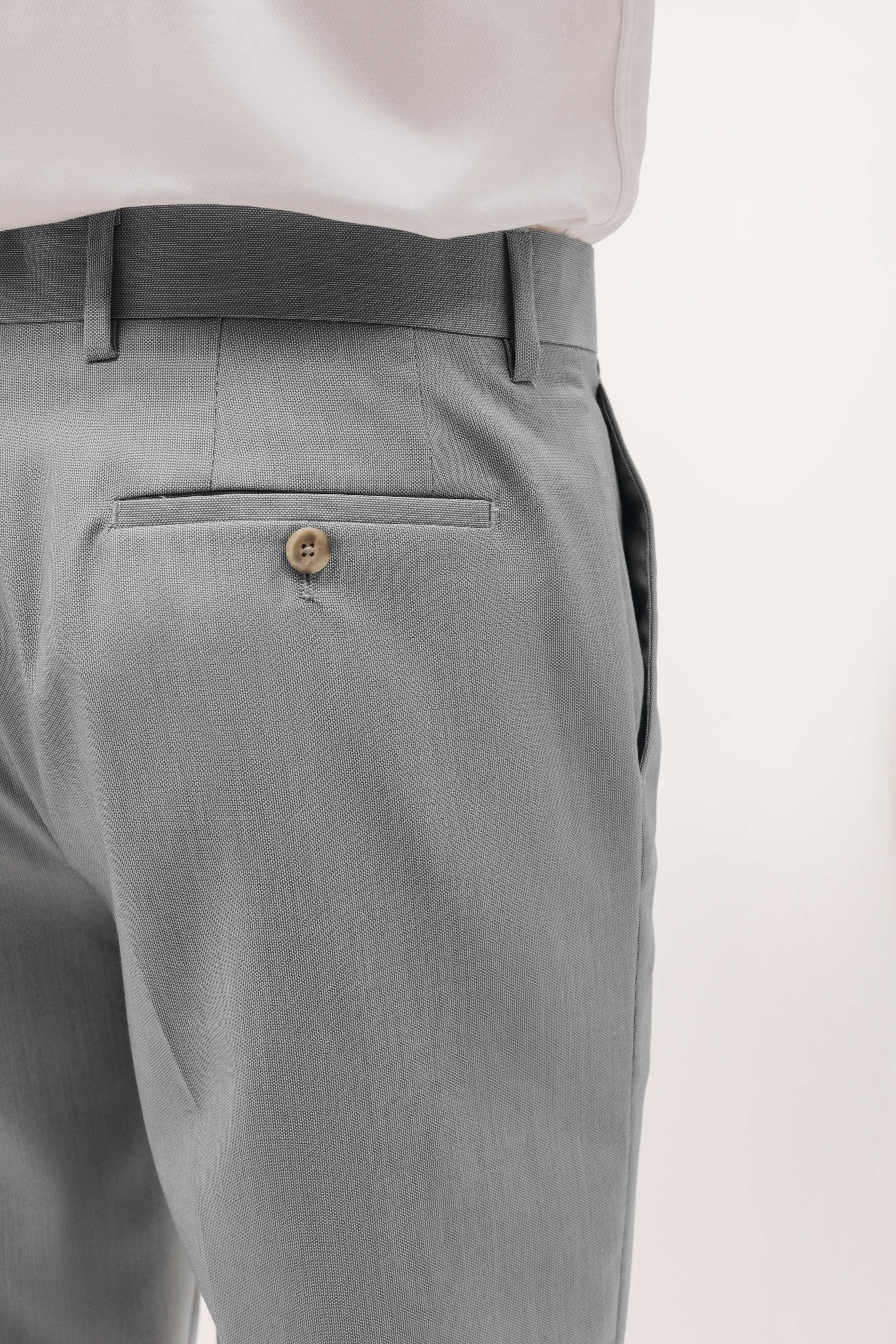 Pantalón traje slim fit falso liso