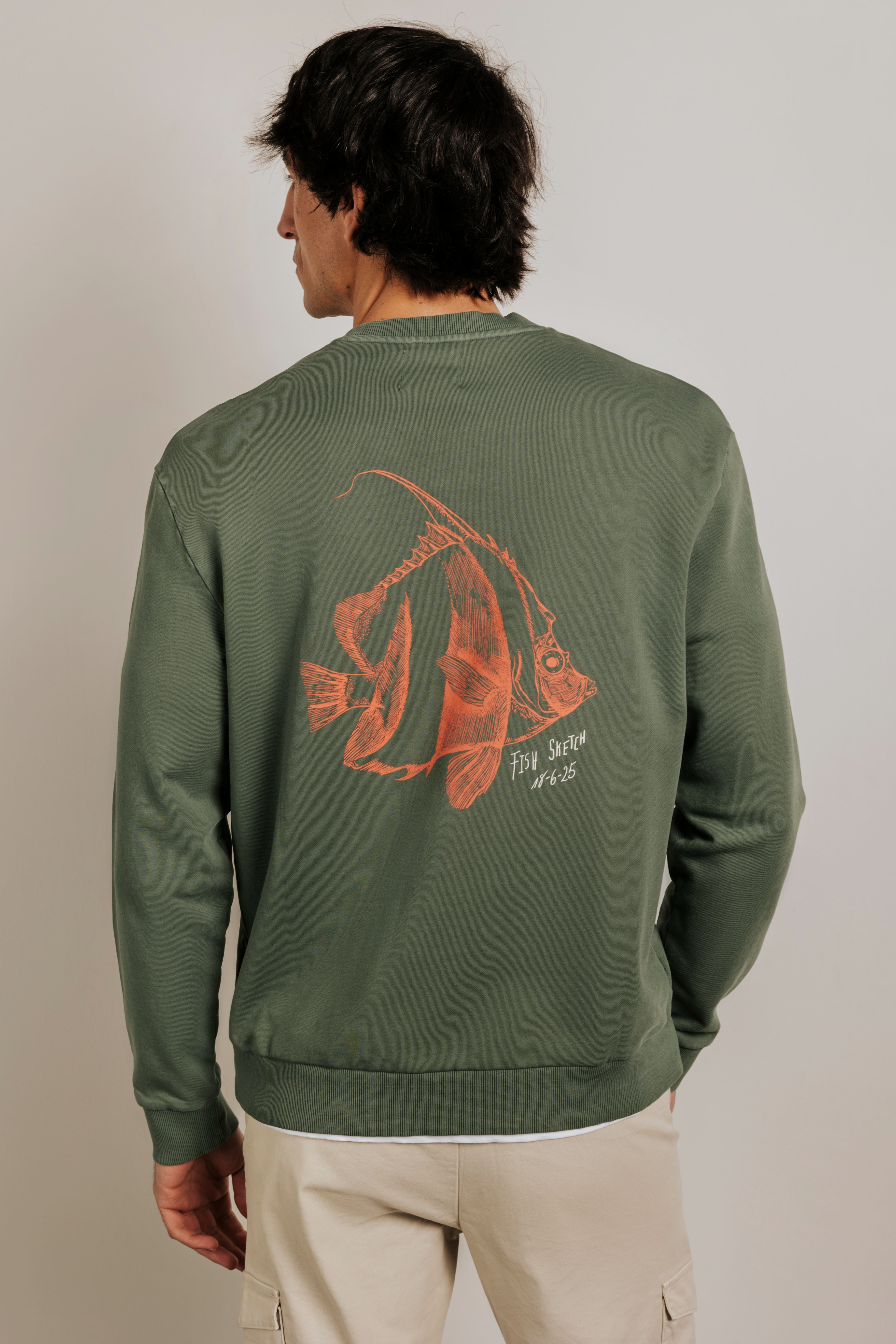 Graphic sweatshirt with a fish design.