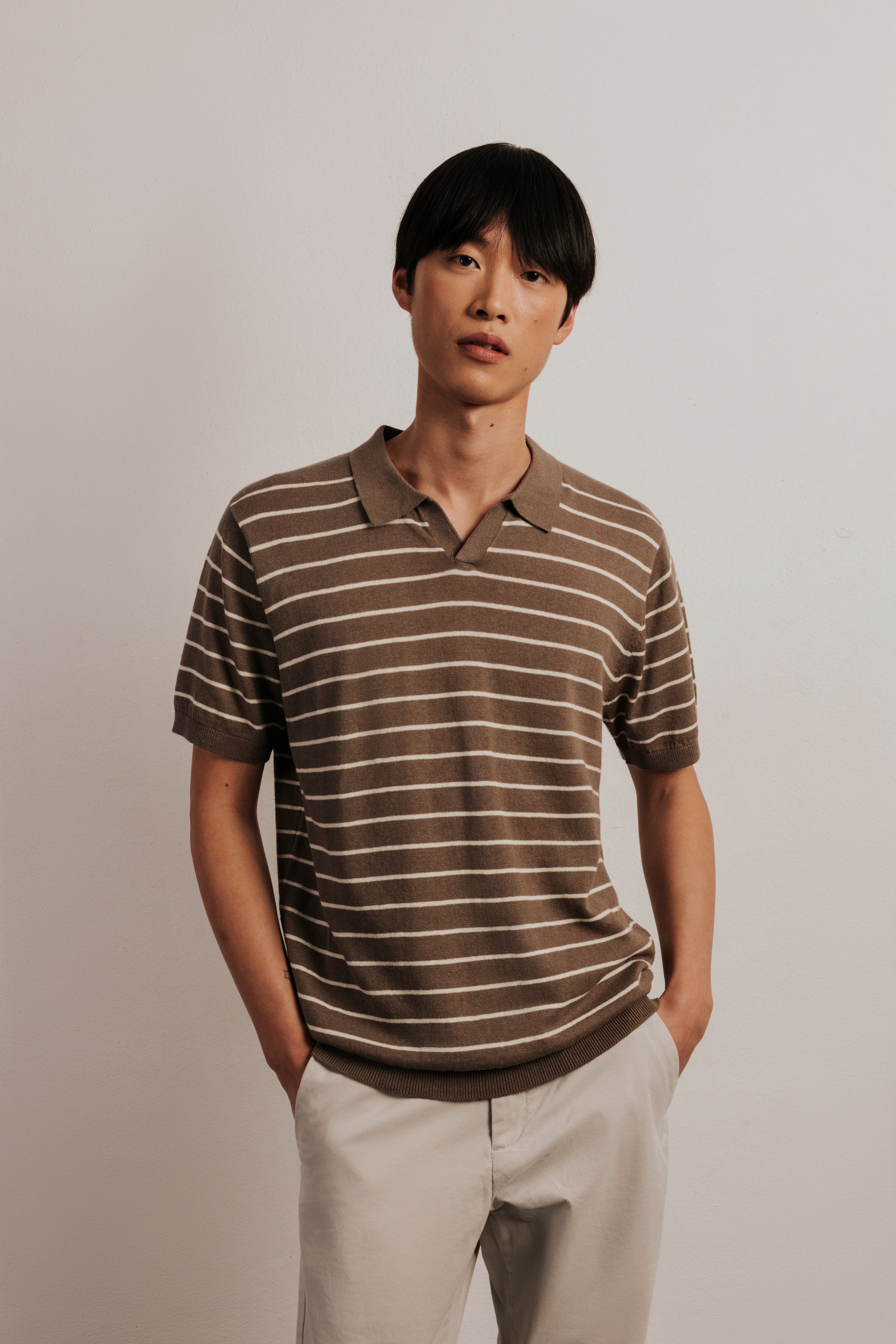 Striped knitted resort polo shirt