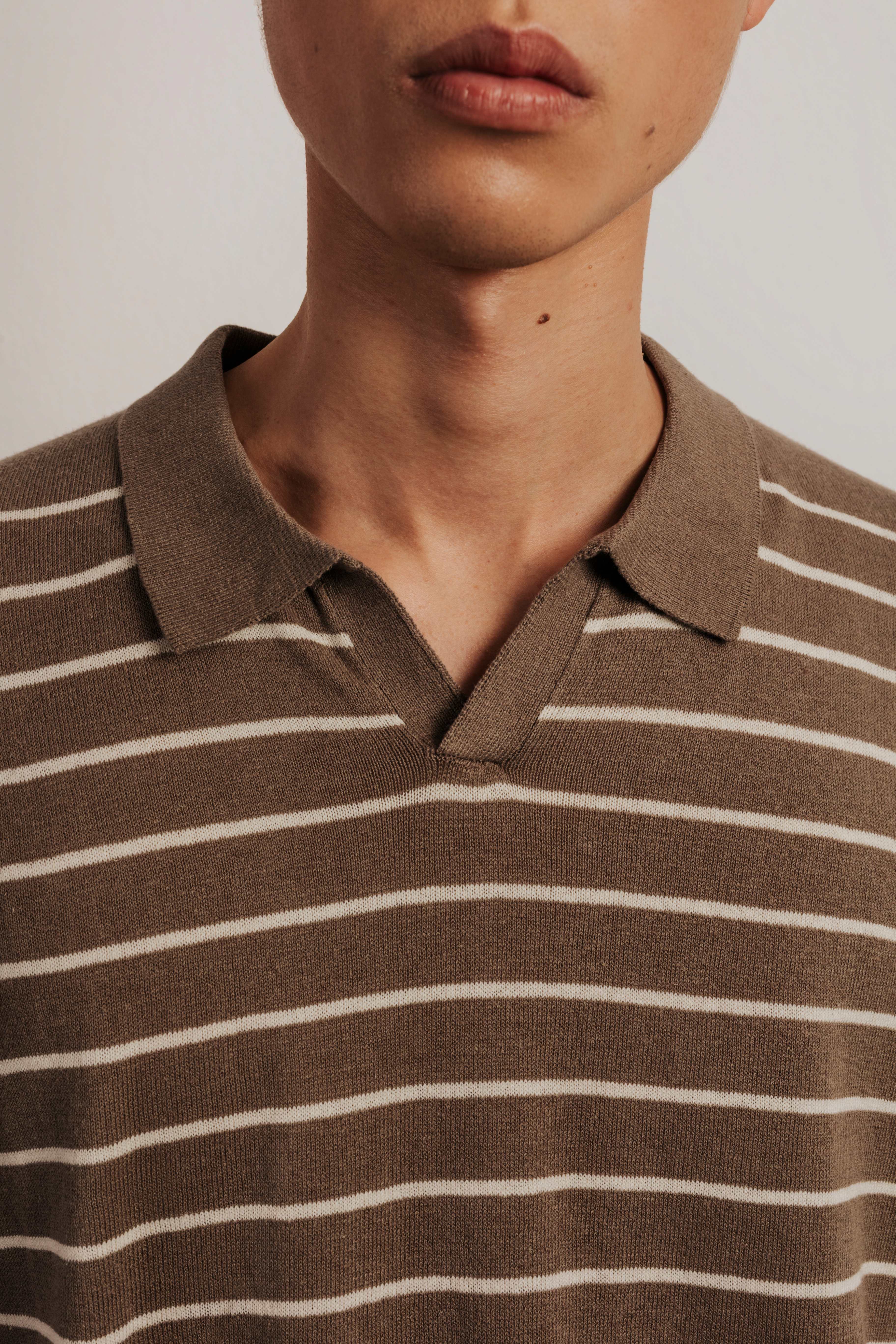 Striped knitted resort polo shirt