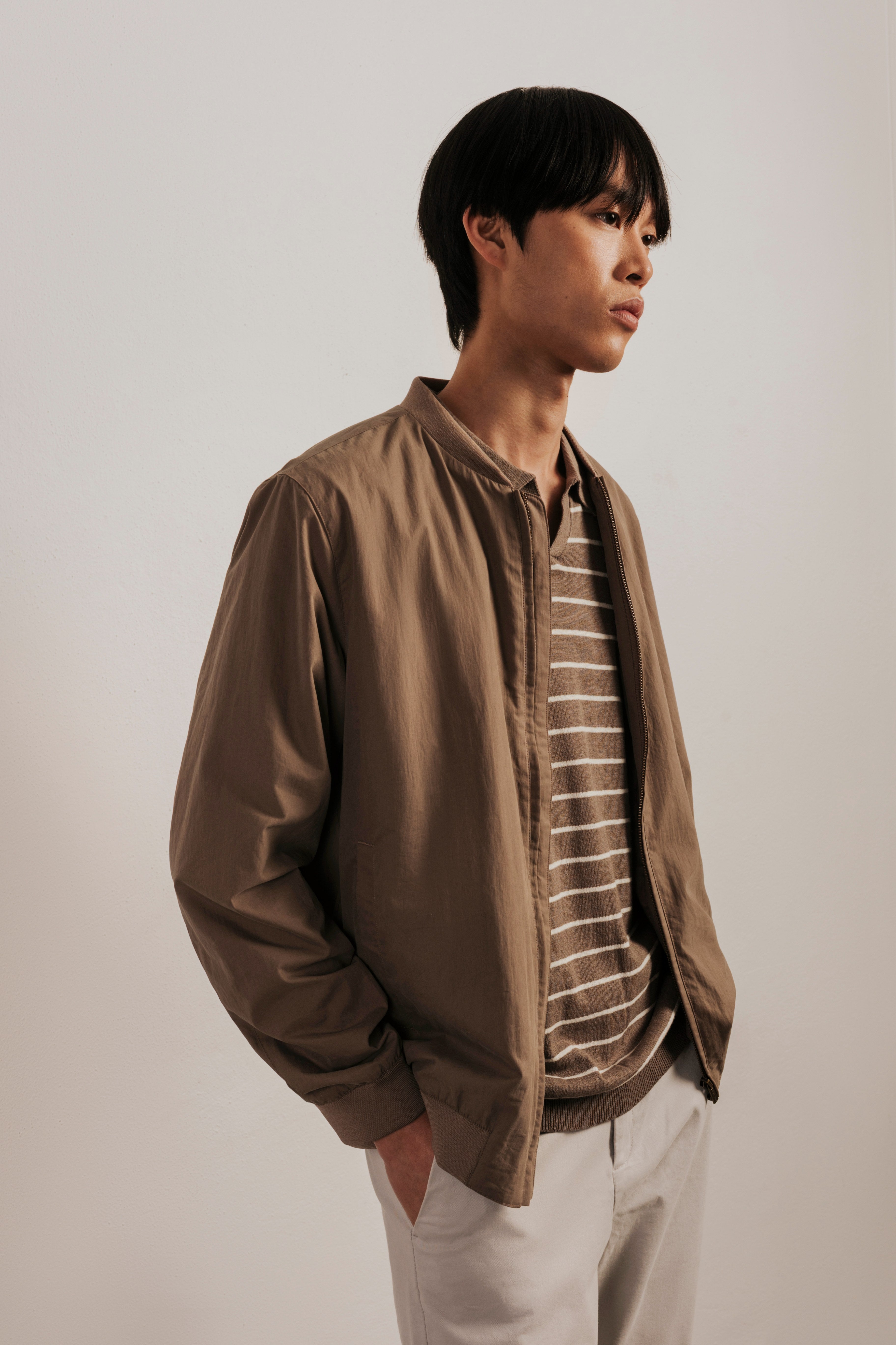 Striped knitted resort polo shirt
