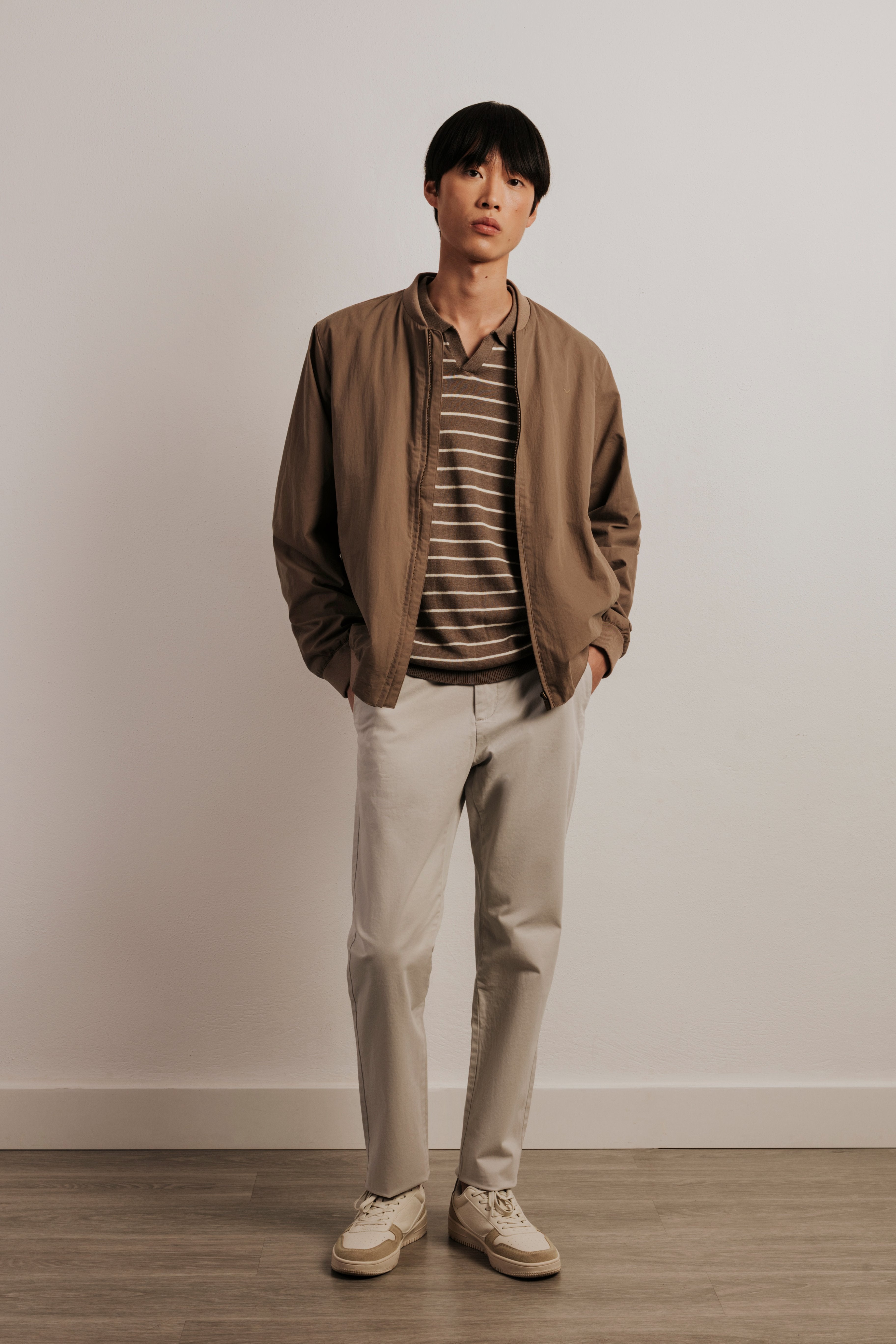 Striped knitted resort polo shirt