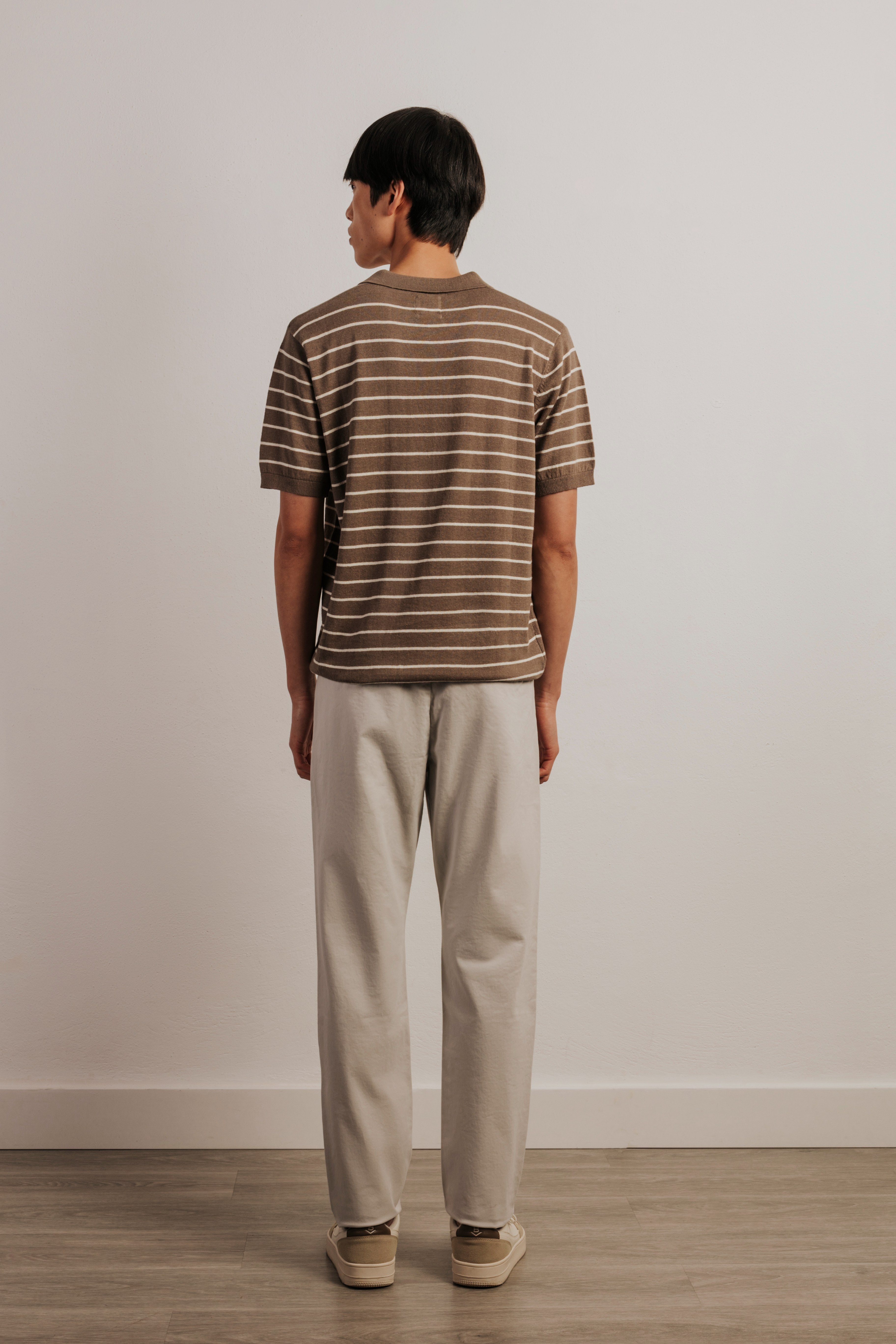 Striped knitted resort polo shirt