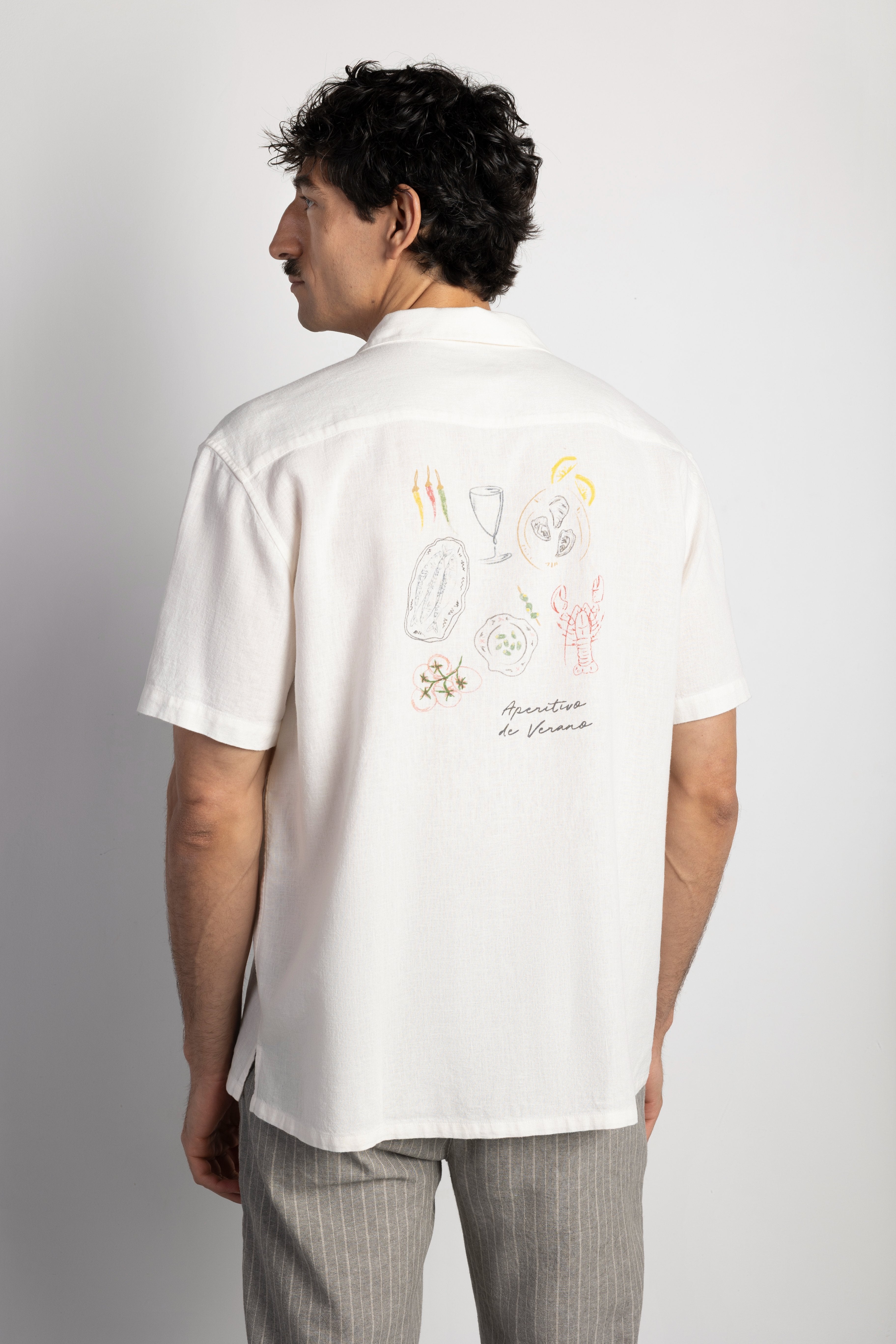 Camisa manga corta print espalda
