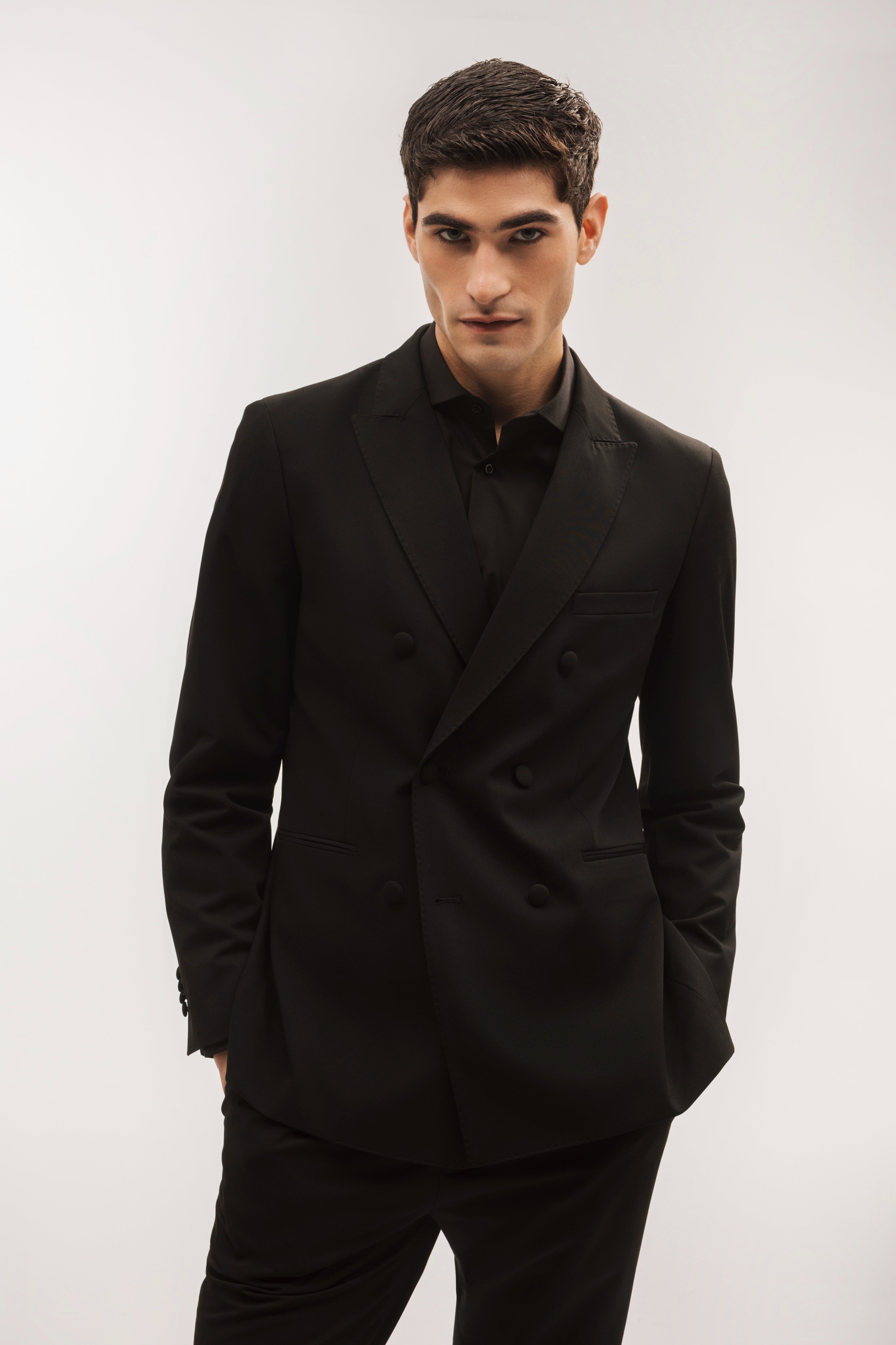 Double-breasted, slim-fit, gala-style suit jacket.