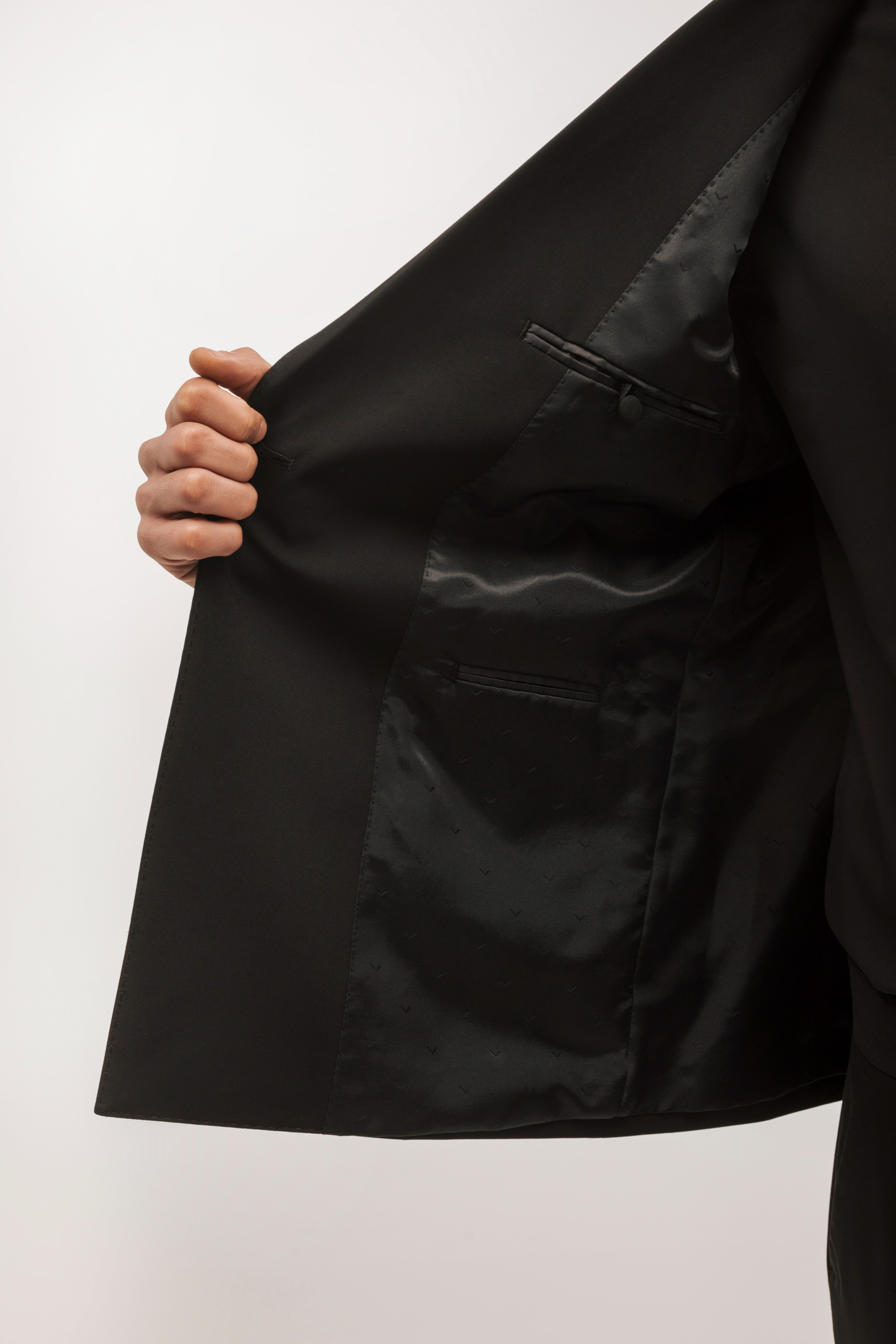 Double-breasted, slim-fit, gala-style suit jacket.