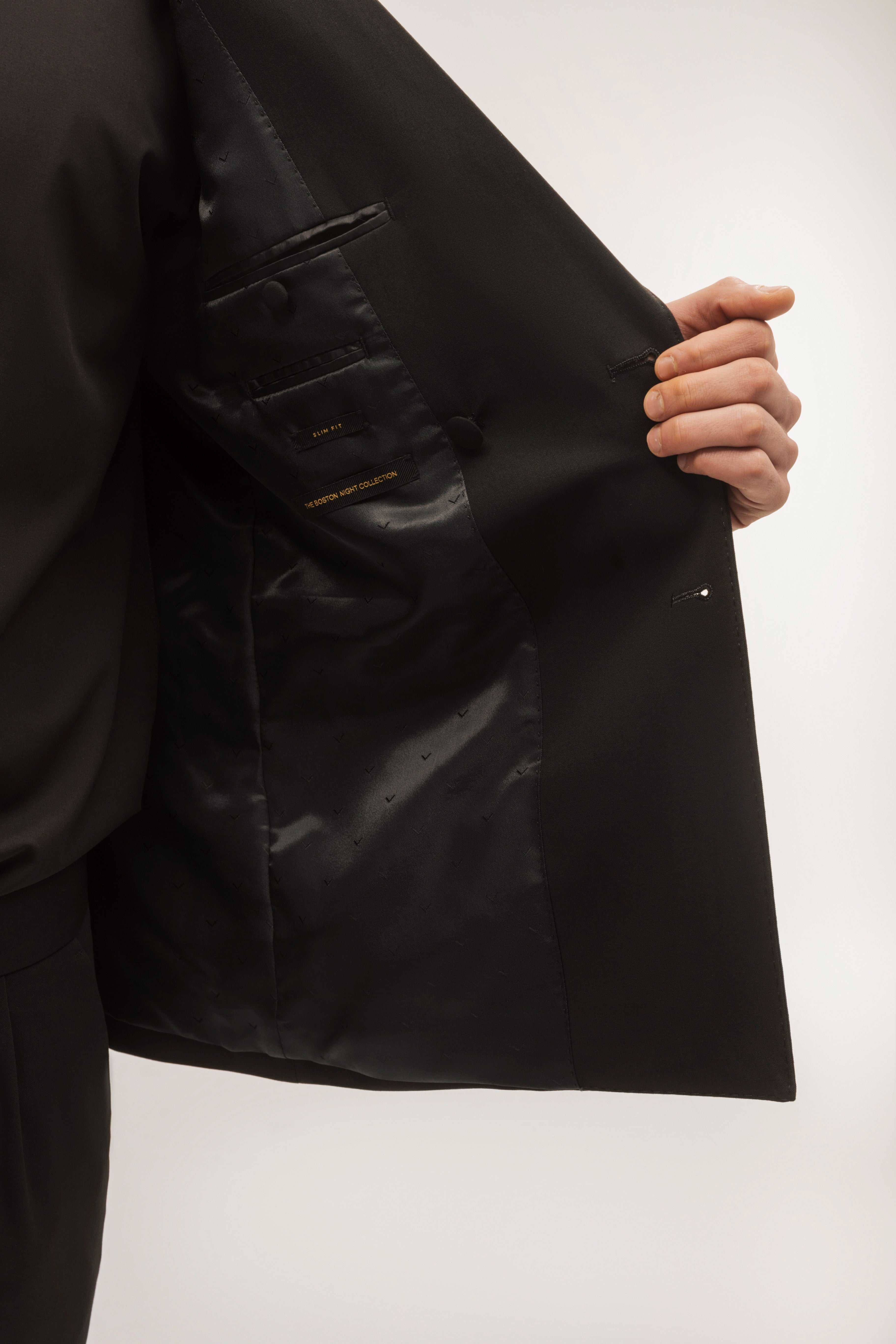 Double-breasted, slim-fit, gala-style suit jacket.
