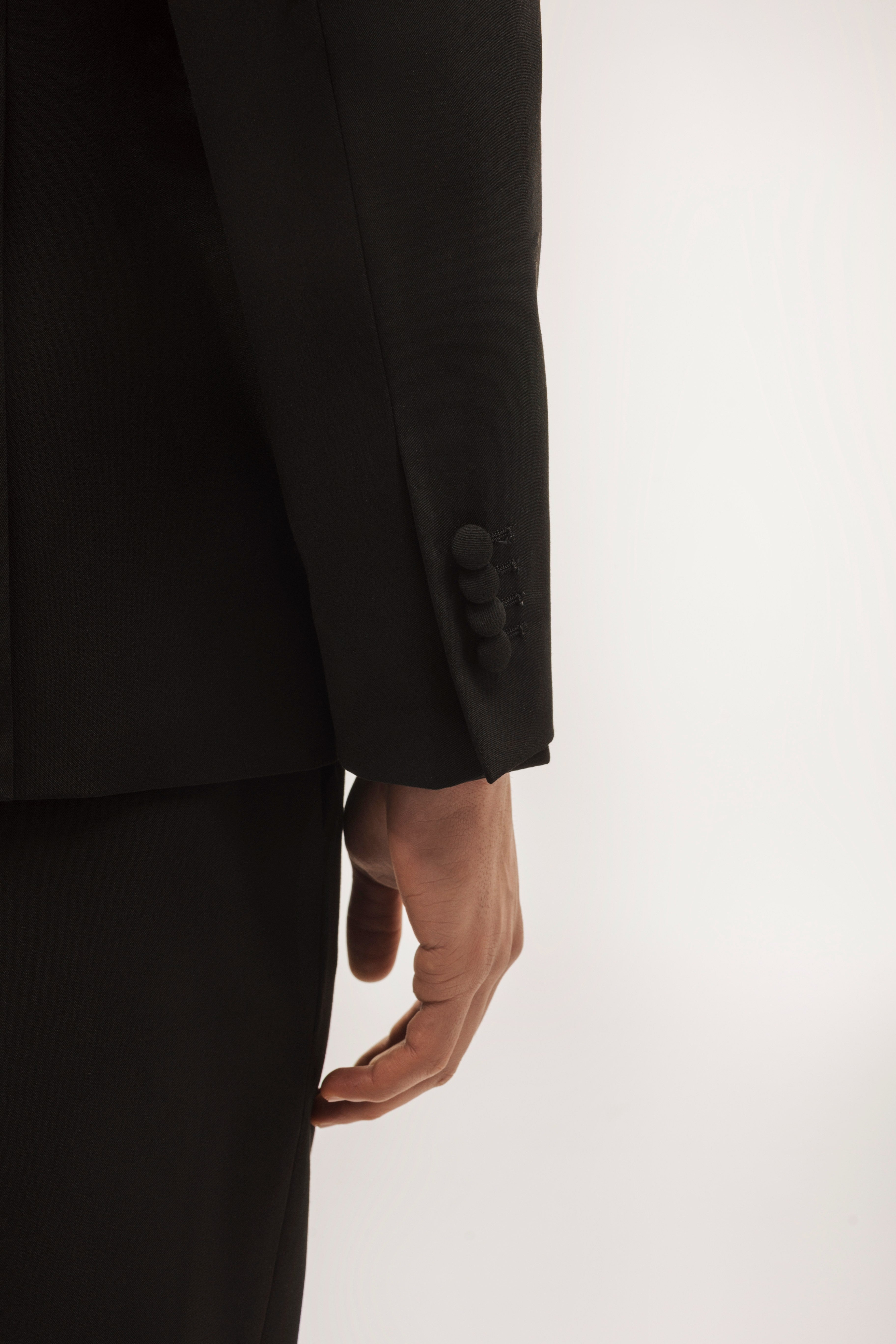 Double-breasted, slim-fit, gala-style suit jacket.