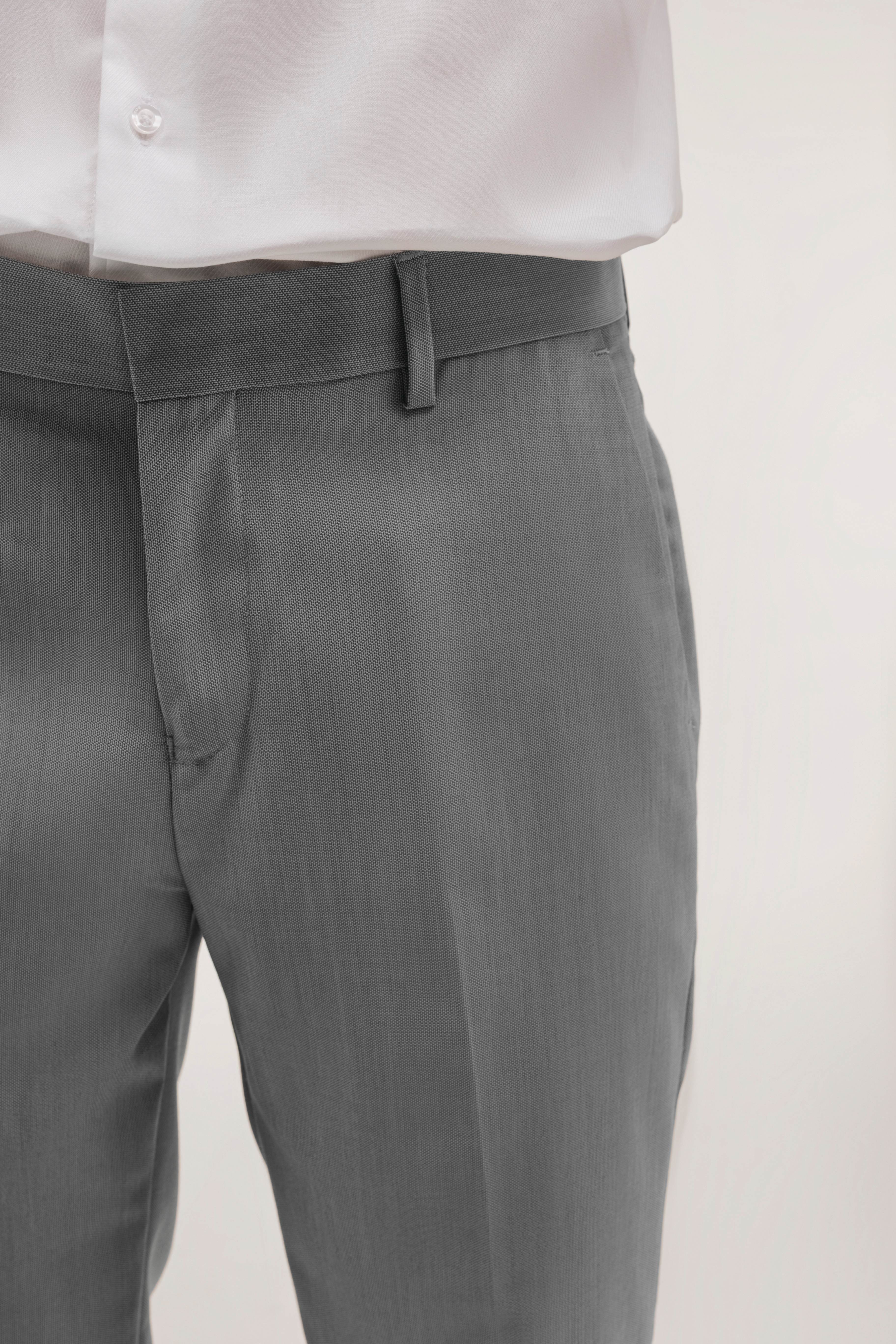 Pantalón traje slim fit falso liso