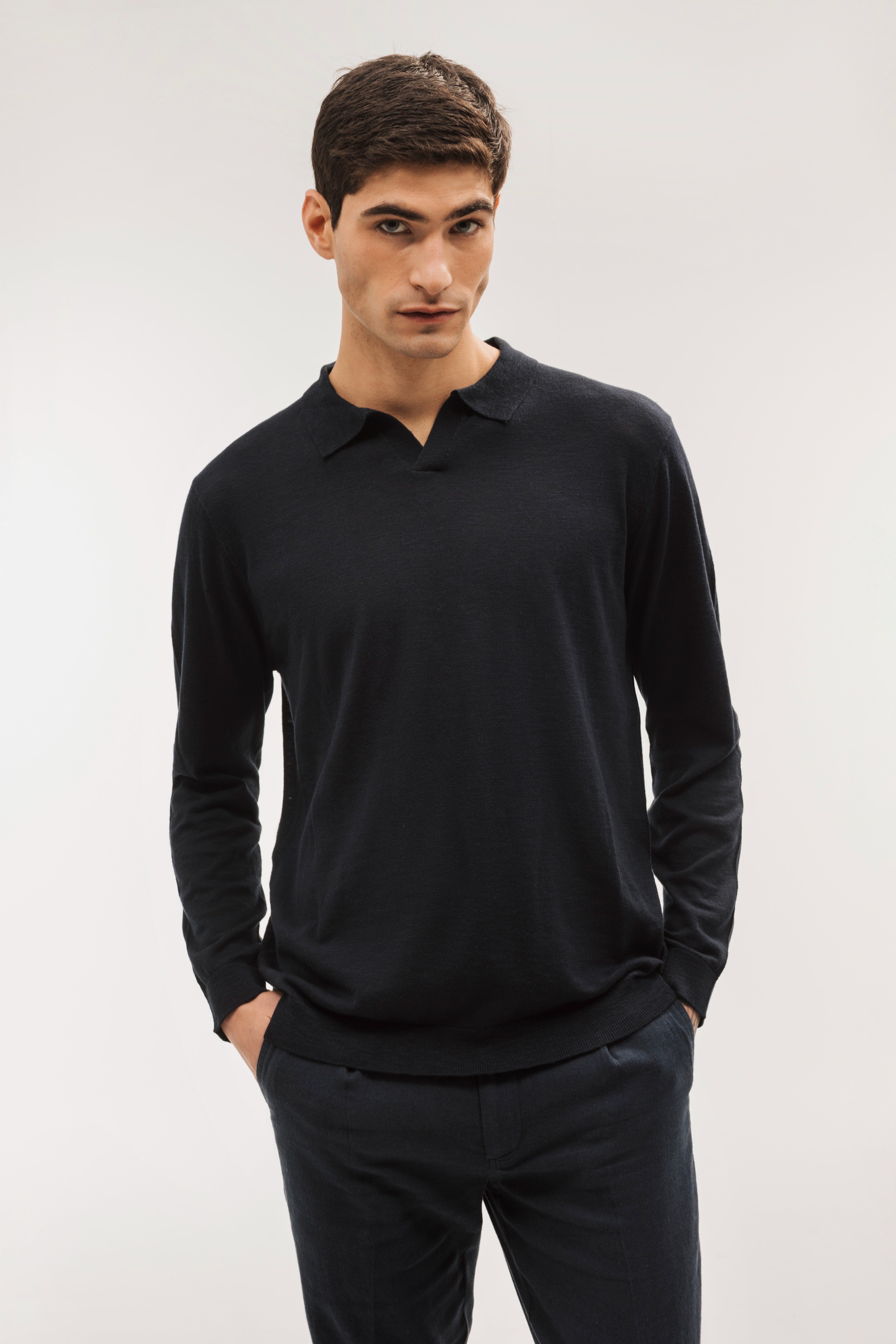Flame-colored polo neck sweater