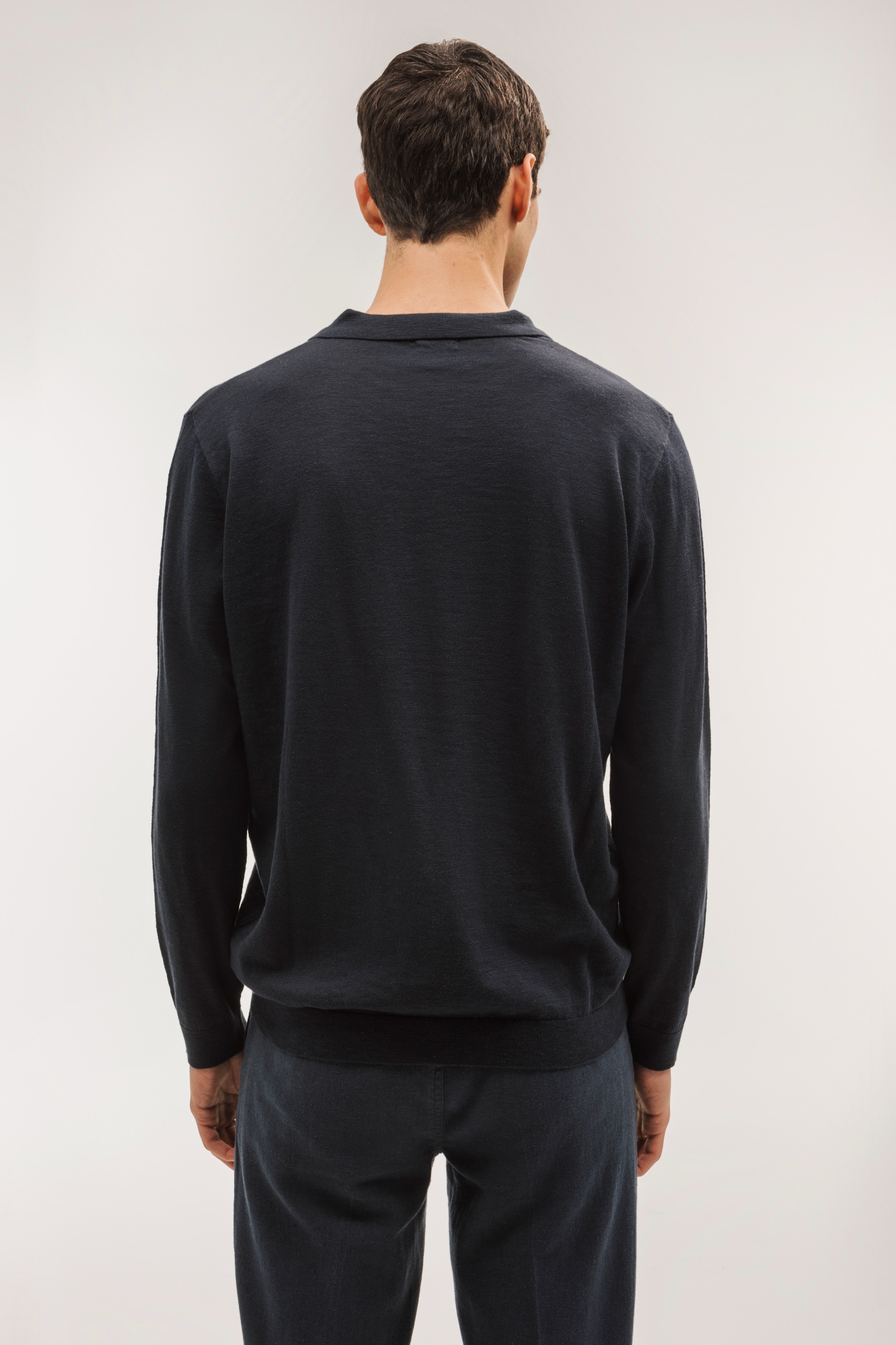 Flame-colored polo neck sweater