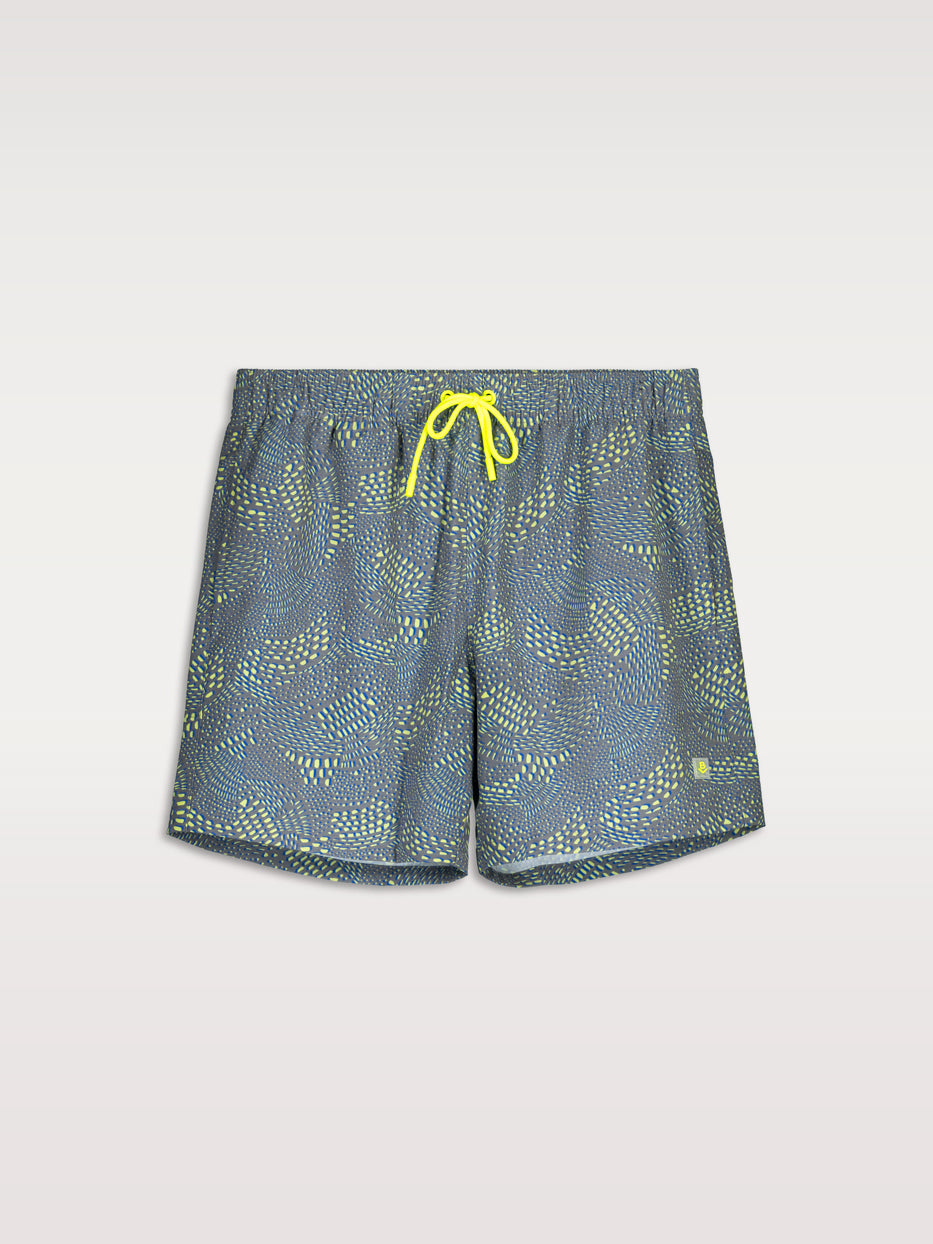 Rubber swimsuit with spotty print.