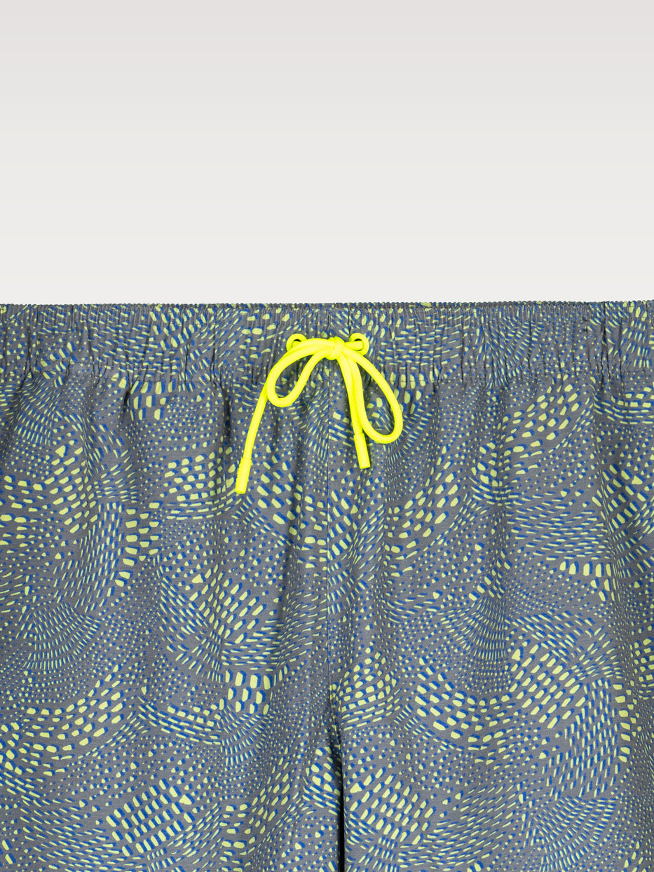 Rubber swimsuit with spotty print.