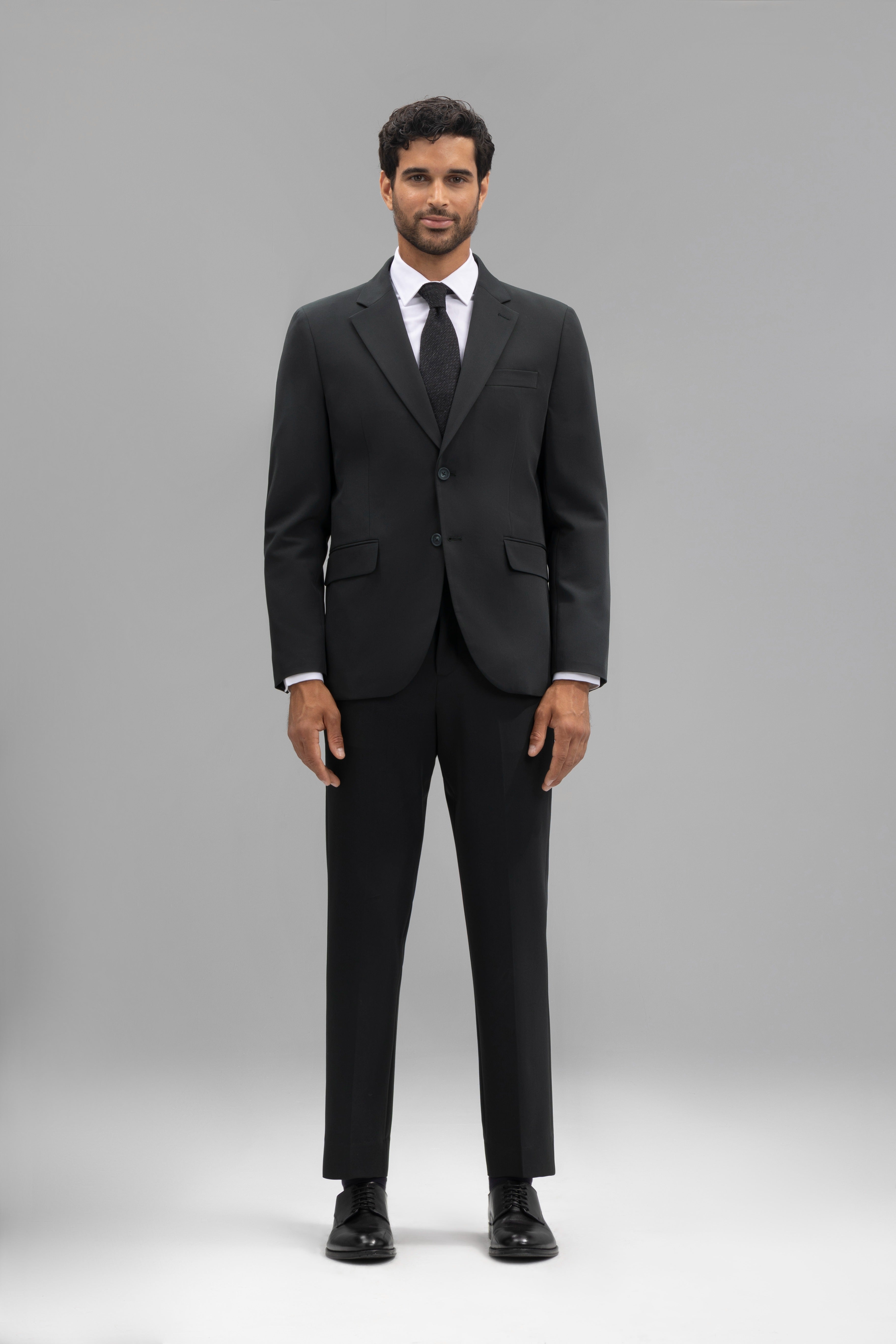 Pantalón traje slim fit liso