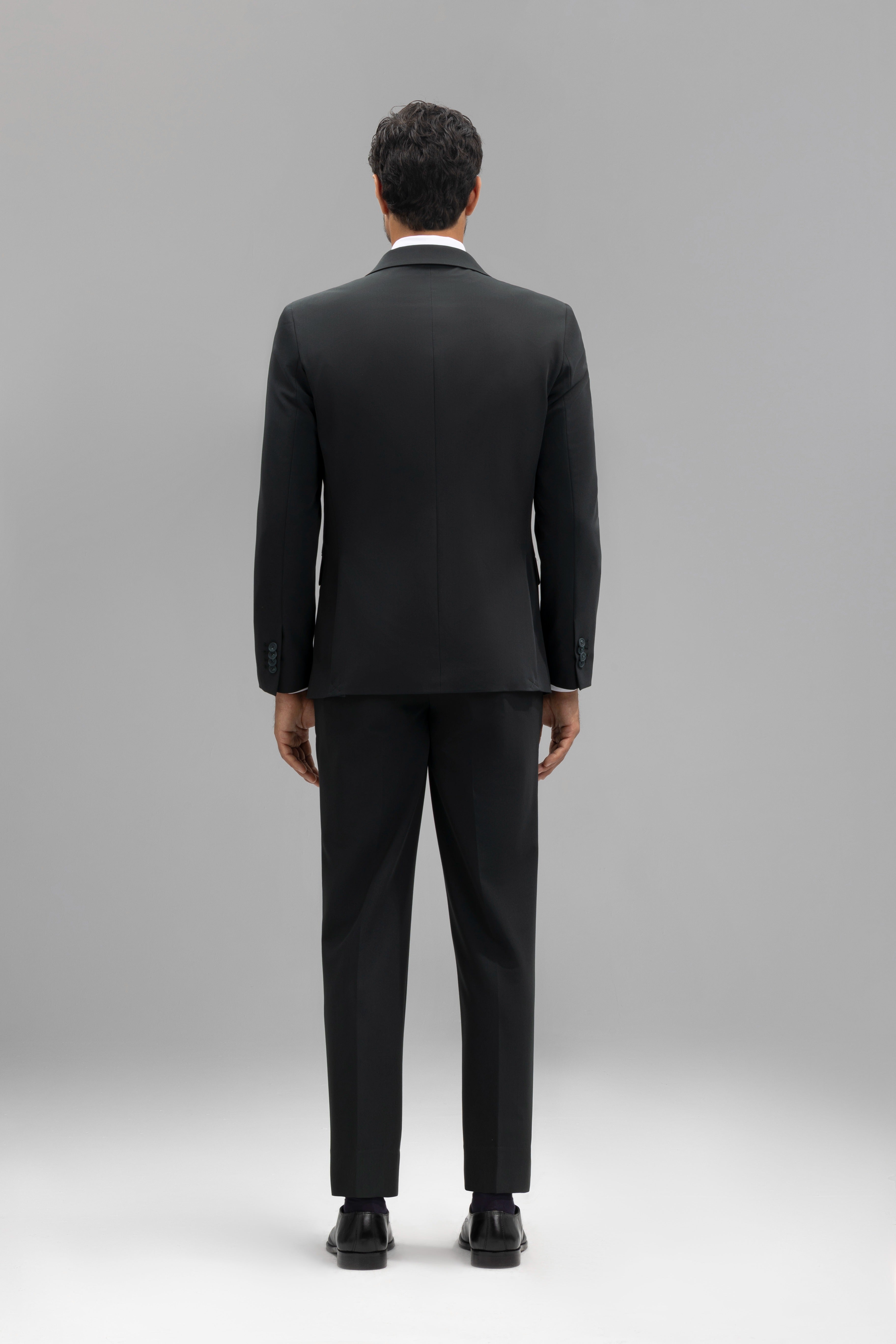 Pantalón traje slim fit liso