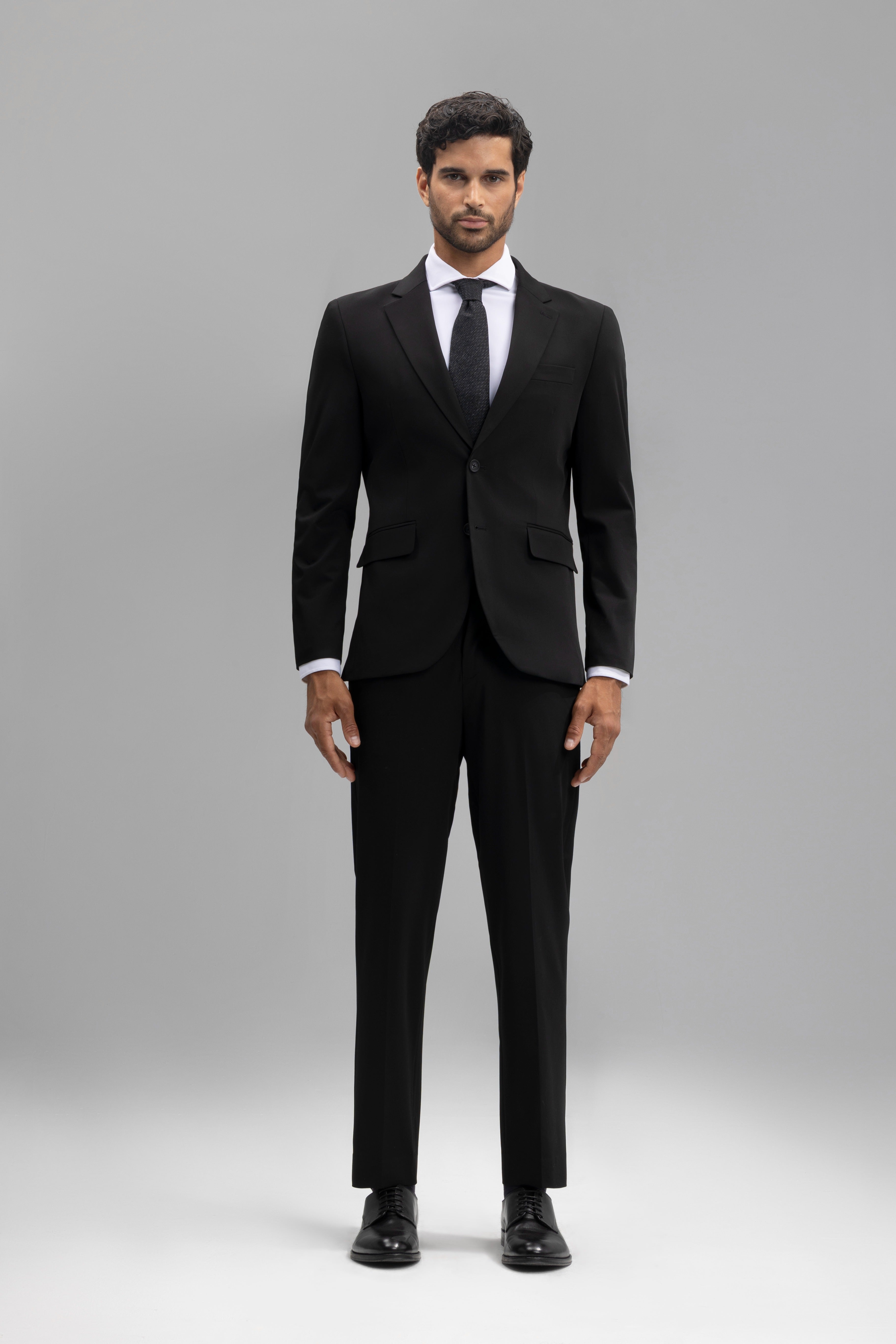 Pantalón traje slim fit liso