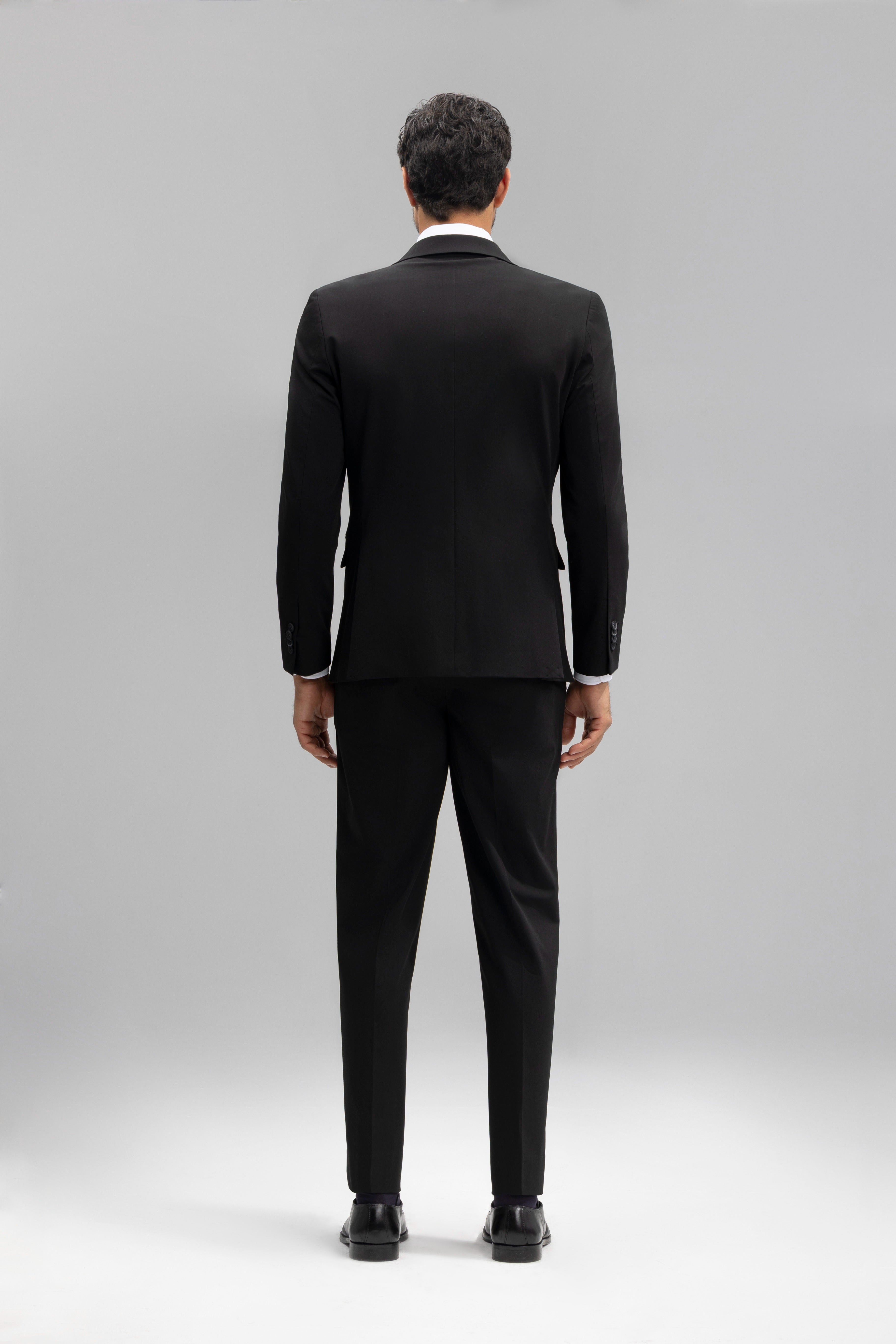 Pantalón traje slim fit liso